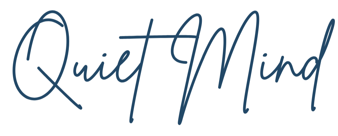 The phrase 'Quiet Mind' written in elegant, cursive font.