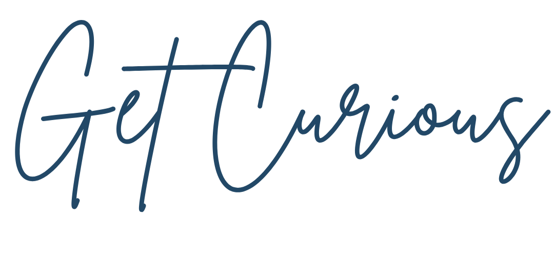 Text in handwritten style that says "Get Curious"