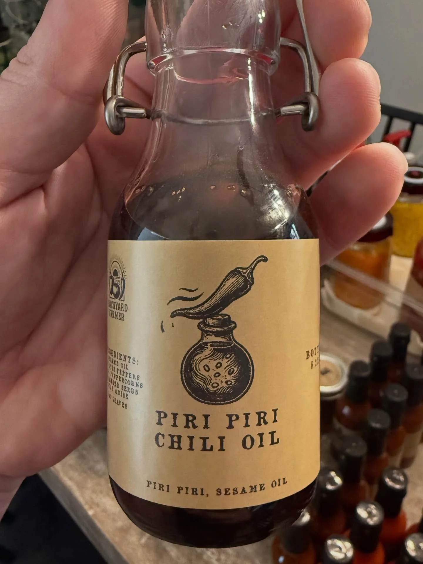 Say hello to Piri Piri Chili Oil &mdash; our latest small-batch creation straight from the Backyard Farmer kitchen.
This bold, aromatic oil blends the unmistakable heat of South African Piri Piri peppers with the rich, toasty flavor of sesame oil, th