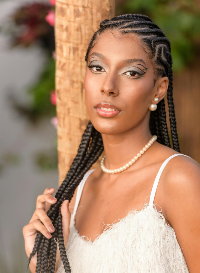 diane braids and salon picture of woman with braids and white dress