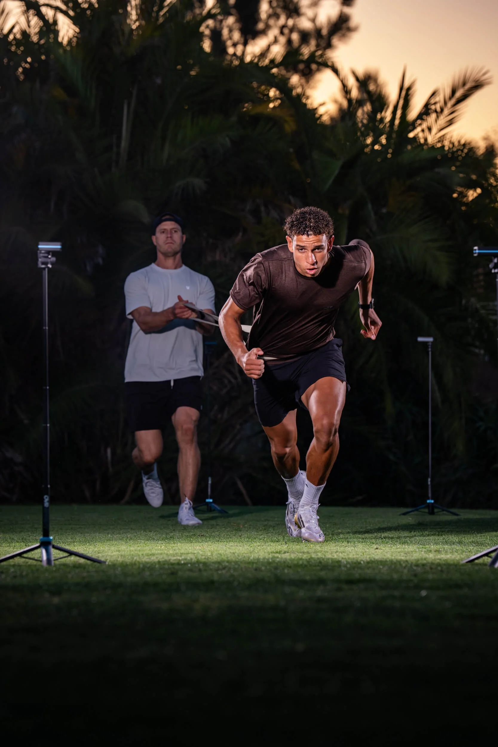 Joe Dell coaching athlete during sprint mechanics session San Diego, CA