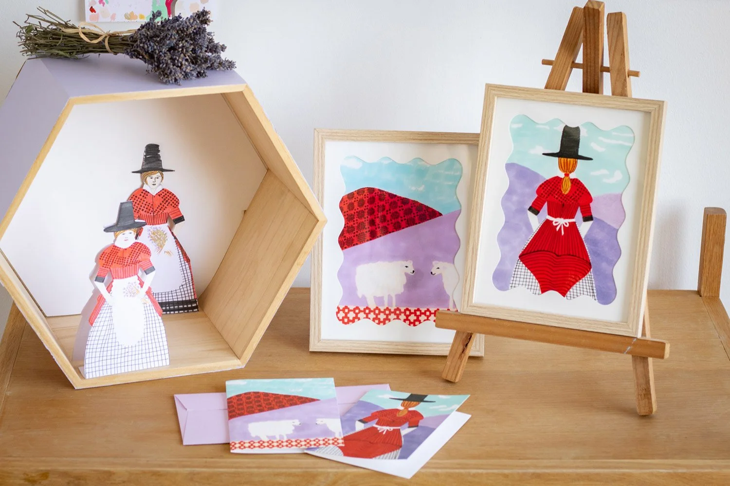 Welsh heritage greeting cards and prints featuring the Welsh Lady wearing the traditional Welsh costume and sheep in the hills with welsh tapestry pattern. 