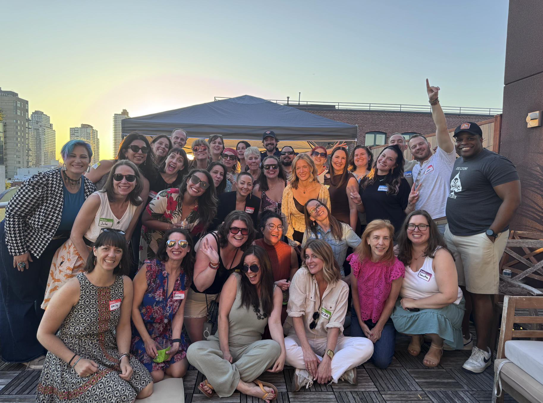Photo of the No BS Mastery students and community at our June, 2026 retreat at the VIP welcome event at Pia Silva's house on her terrace.