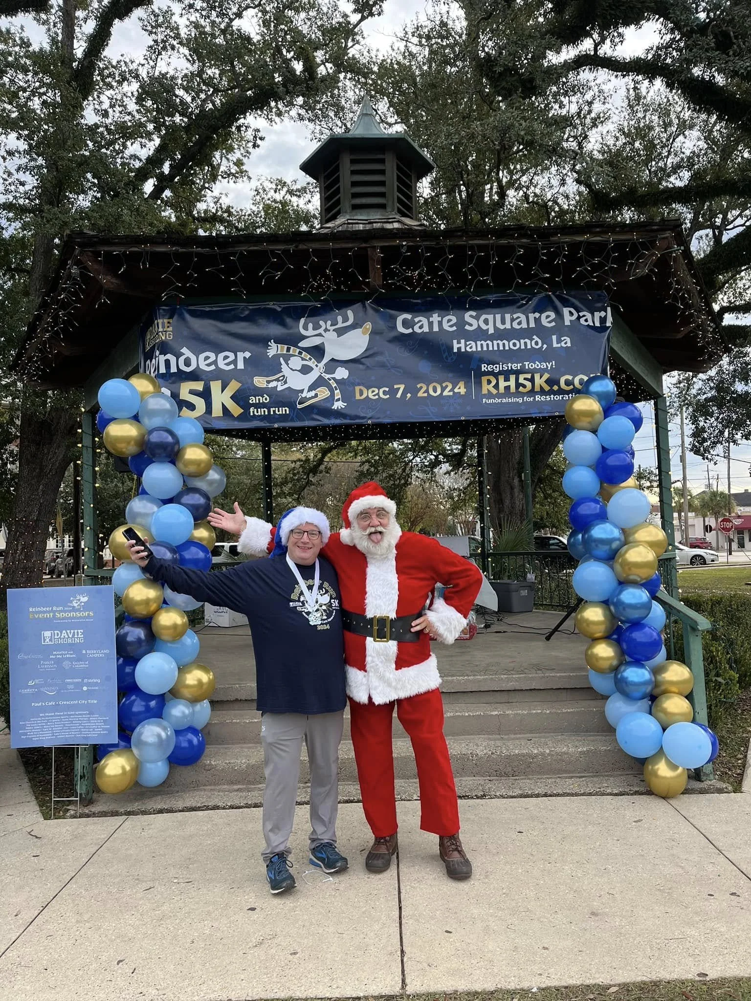 restoration-house-reindeer-run-2024-finish-line-santa.jpg