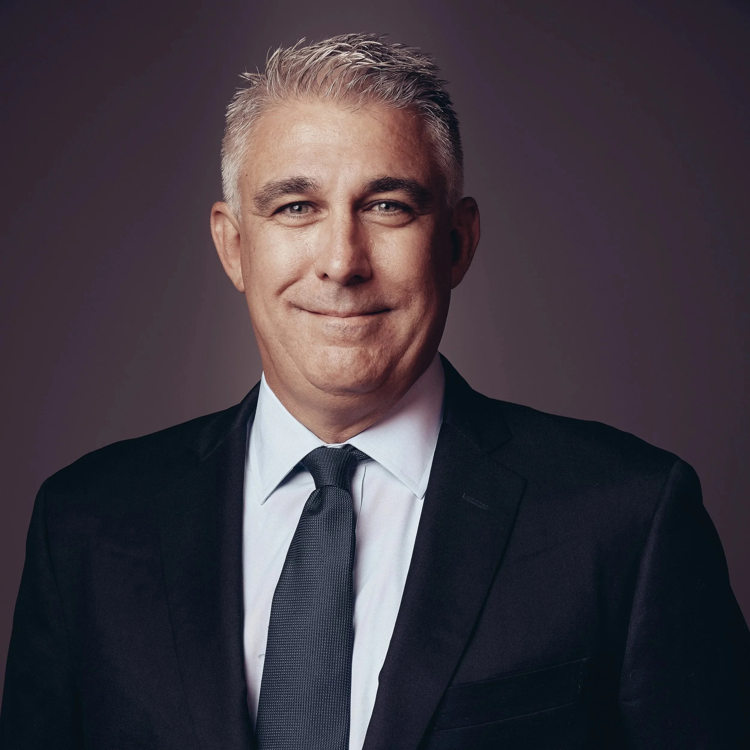 Portrait of John Mitchell, Managing Director at Gray Oak Capital.