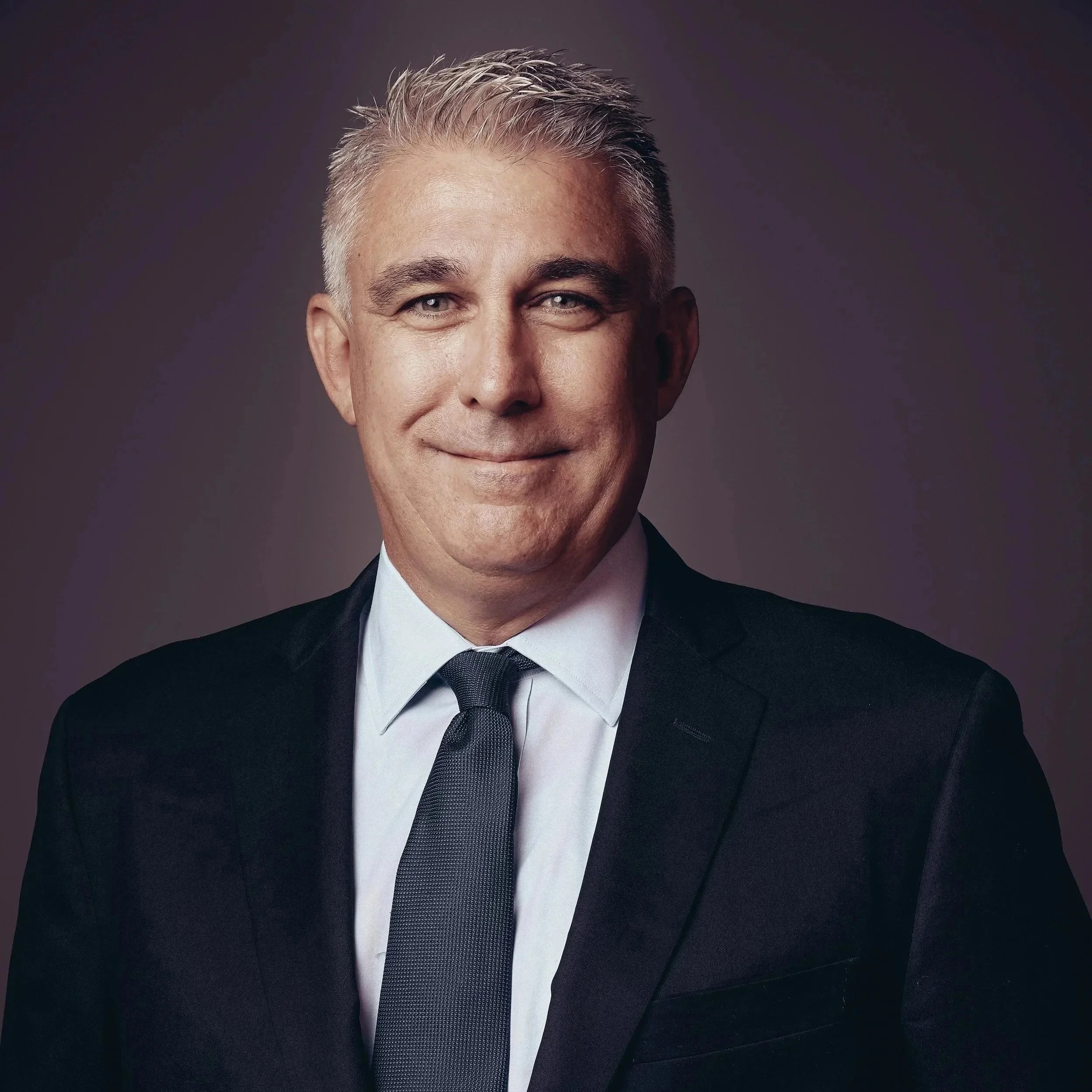 Portrait of John Mitchell, Managing Director at Gray Oak Capital.