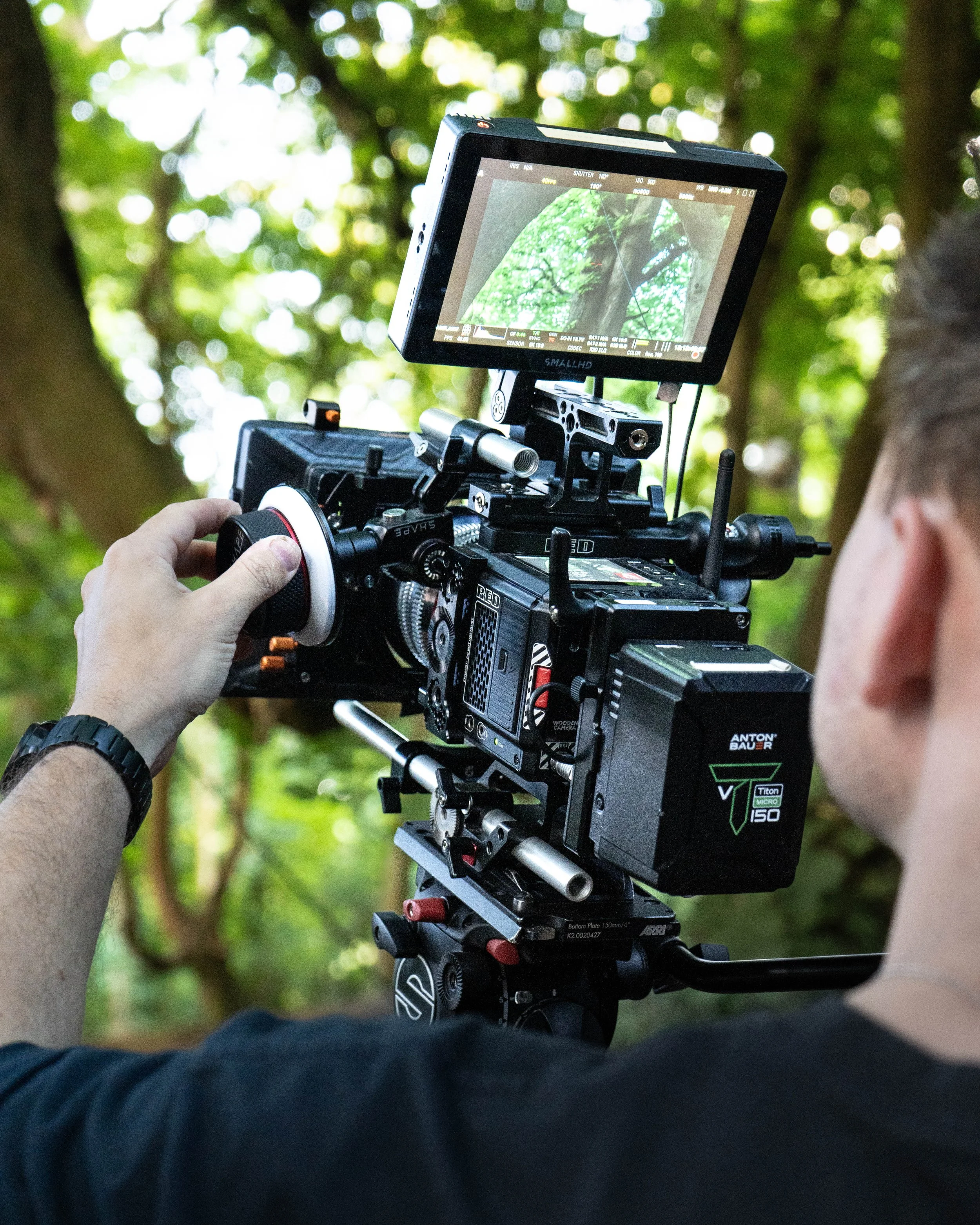 Stan Thornton - operating a cinema camera on a film set in the forest