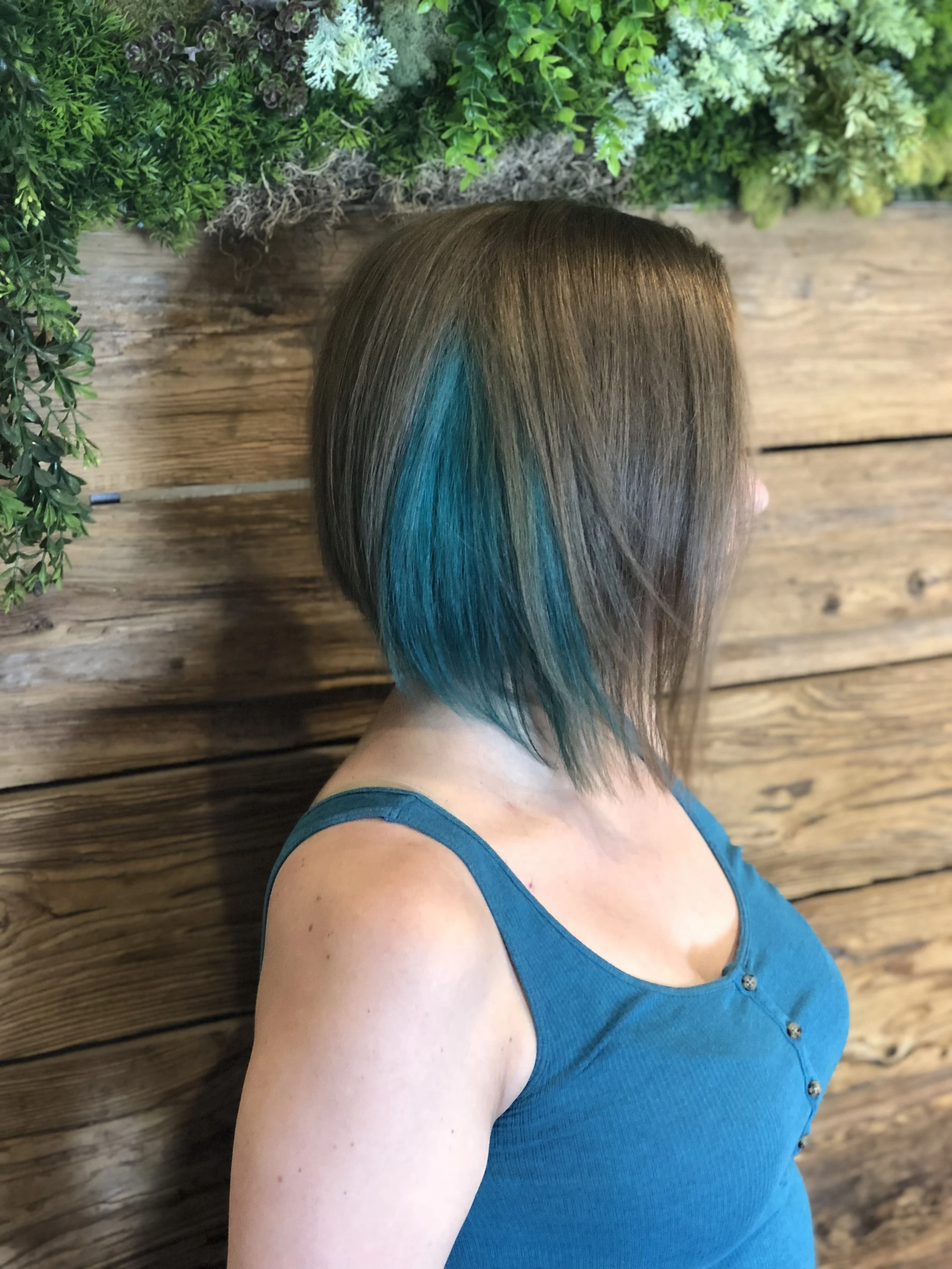 After: Short bob haircut and turquoise blue color piece