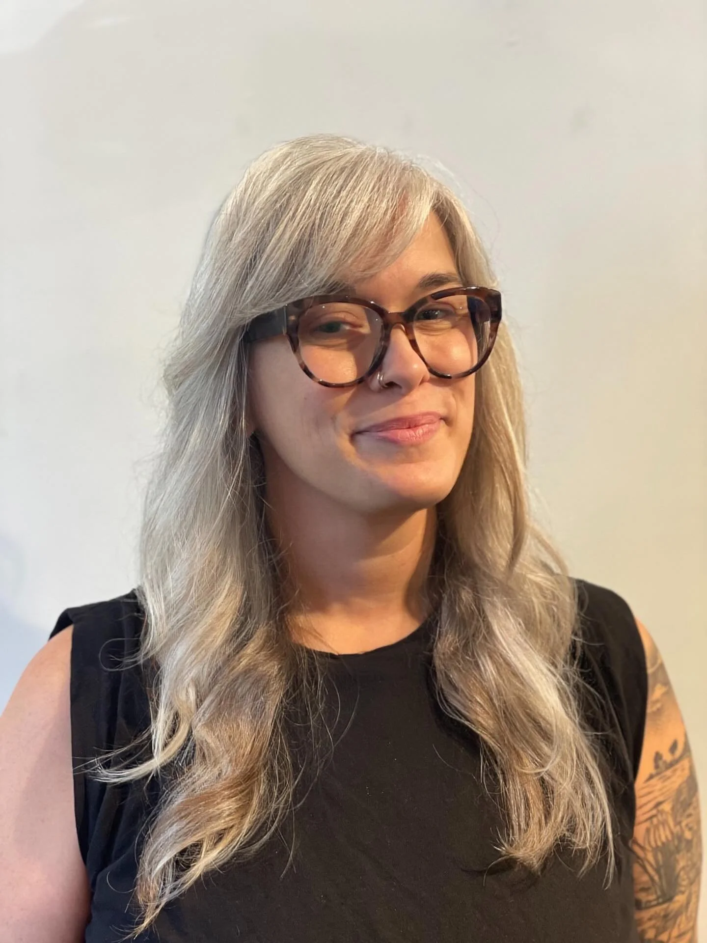 This is her hair color! So pretty. Long layered with side swept fringe.