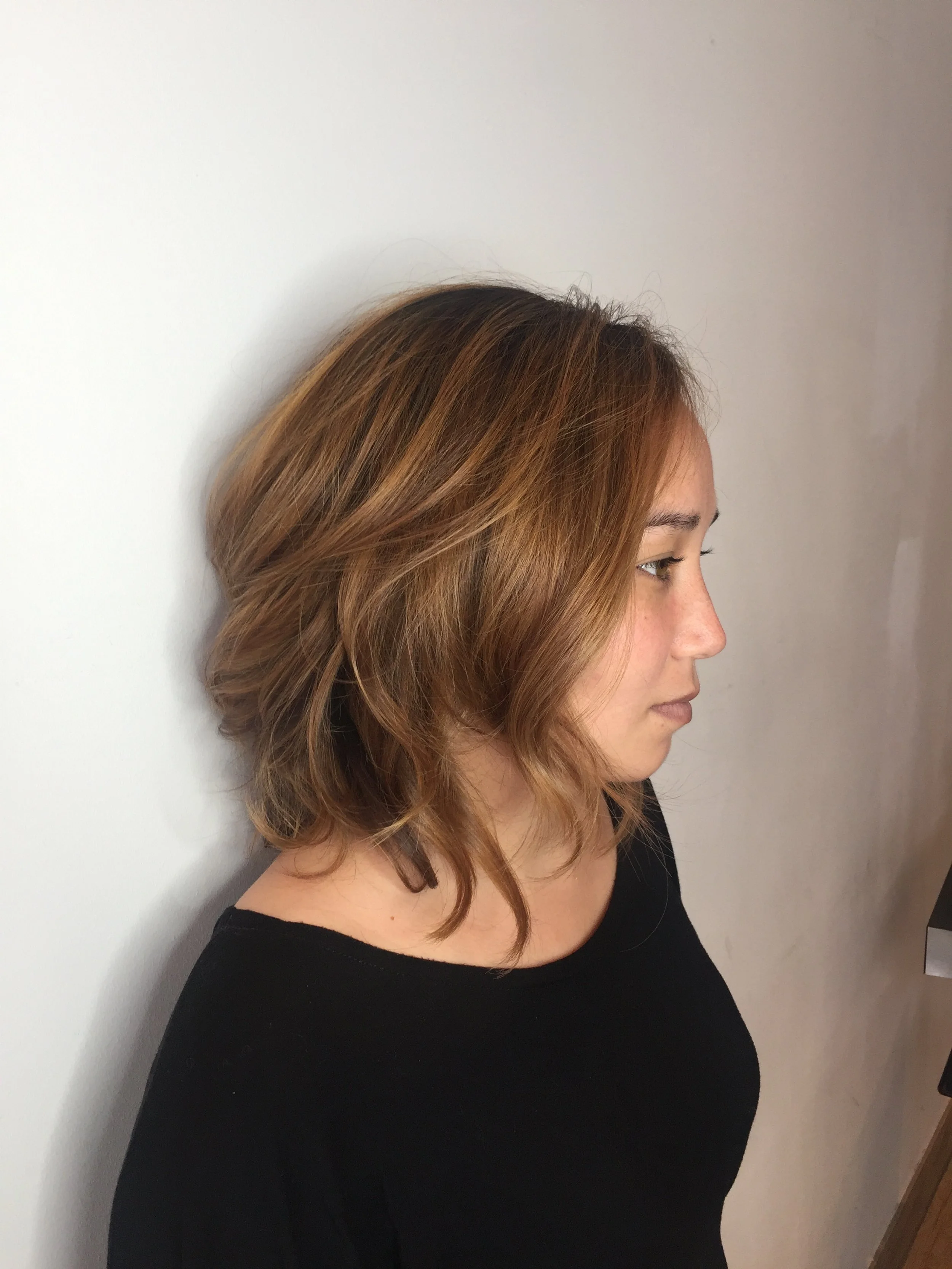 After: Warm highlights and layered hair cut