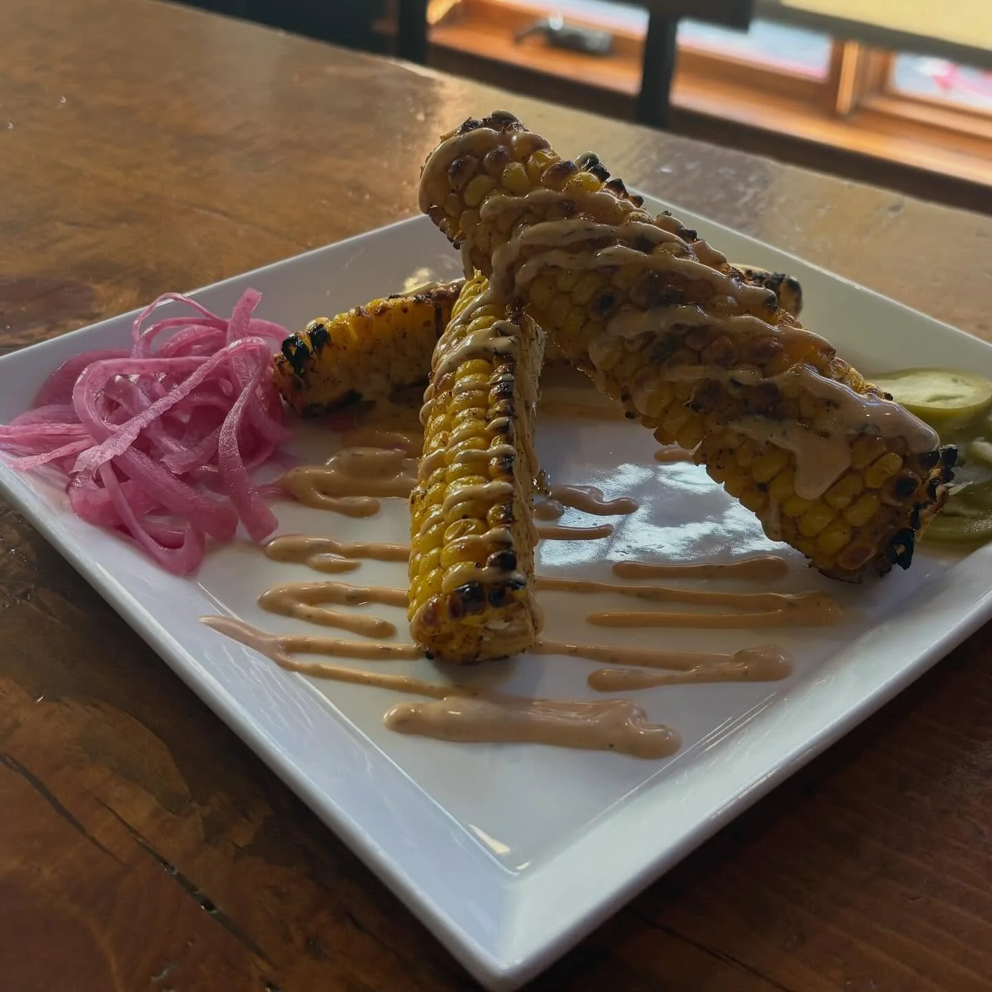 Corn Ribs! Let&rsquo;s go! Mesquite roasted corn with a Sriracha-Ranch and pickled jalape&ntilde;os. Get &lsquo;em while they last!
