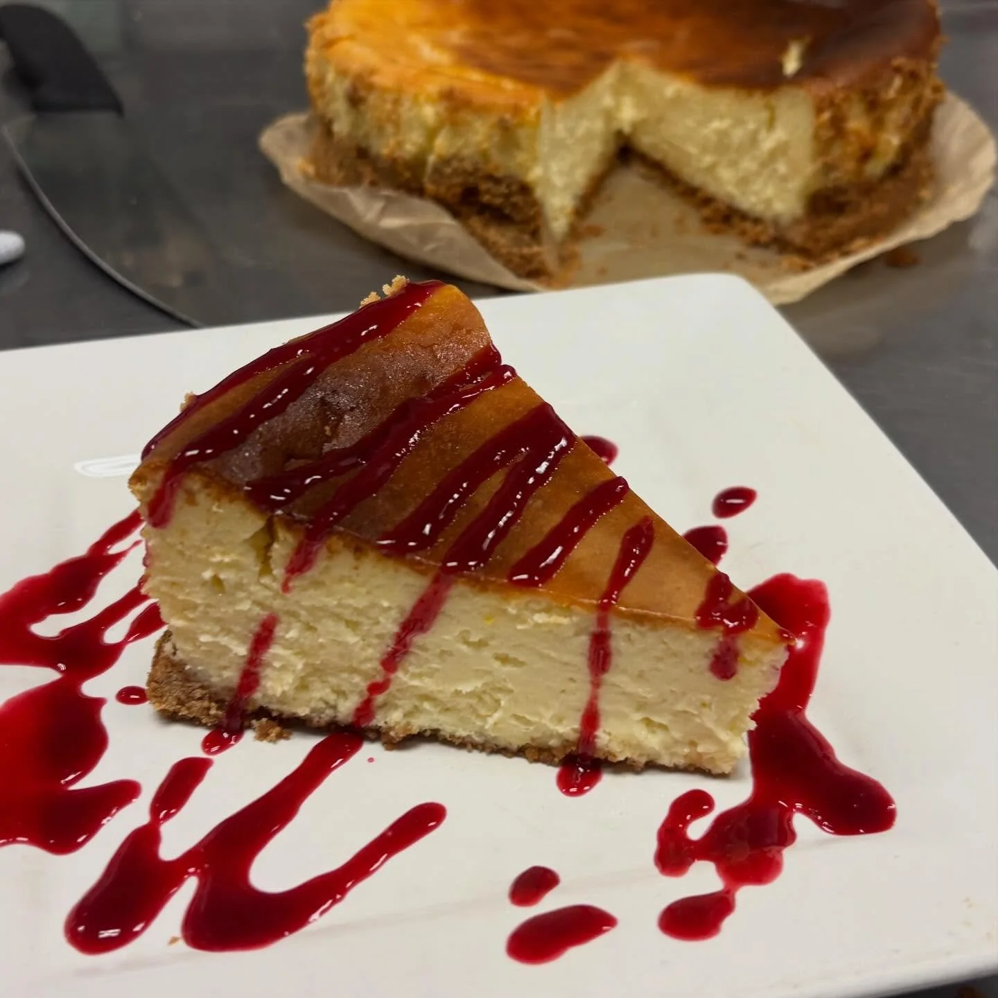 Classic New York Cheesecake with a Raspberry Drizzle brought to you by our amazing dessert chef, @_batterborn Get it while it lasts!