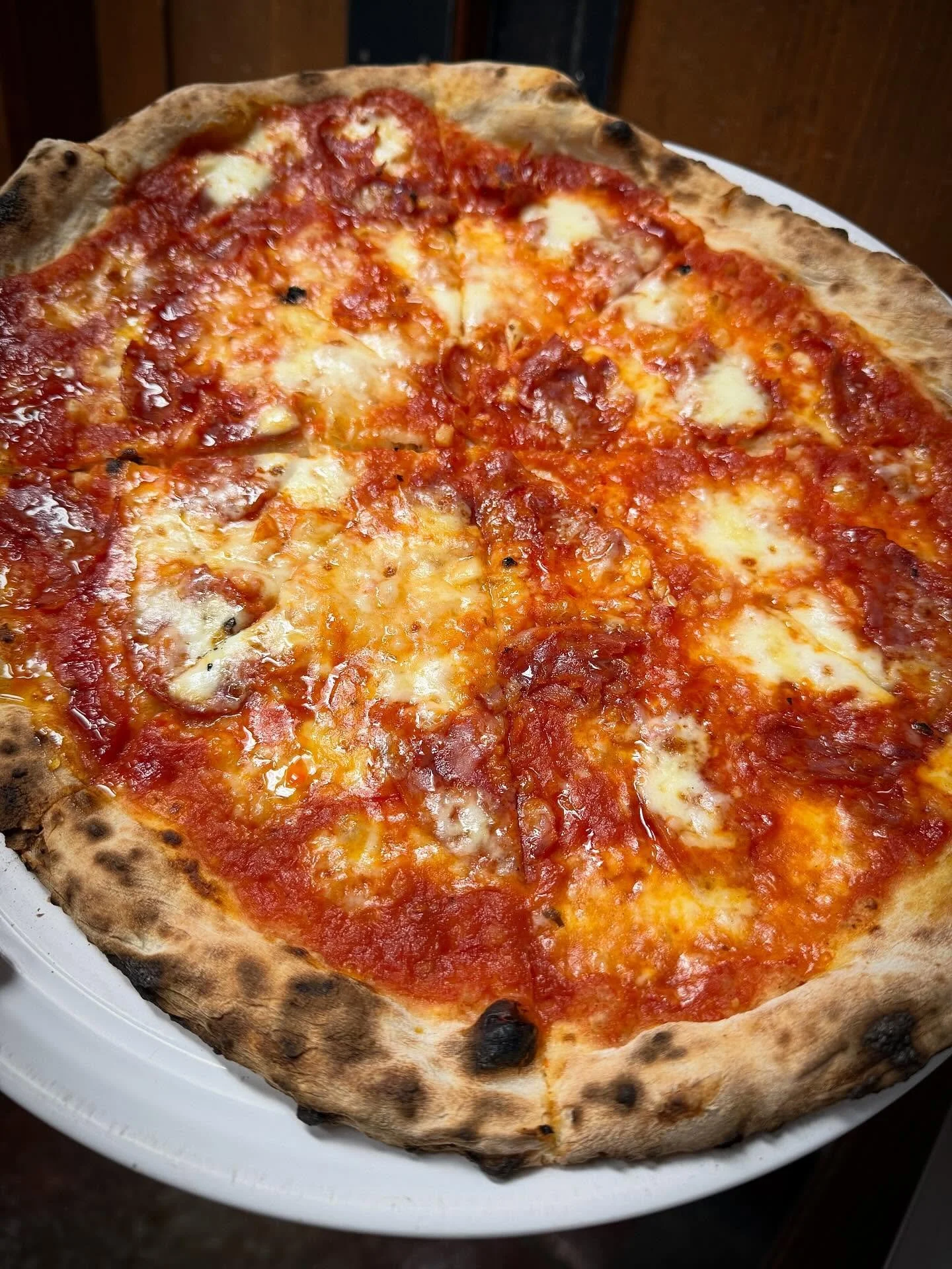 The Hot Hangover- we took @truckeehotsauce and mixed into our tomato sauce for a spiced out base. Added garlic, mozzarella, soppressata, and finished this wild guy off with hot honey. Can you handle it? 🌶️