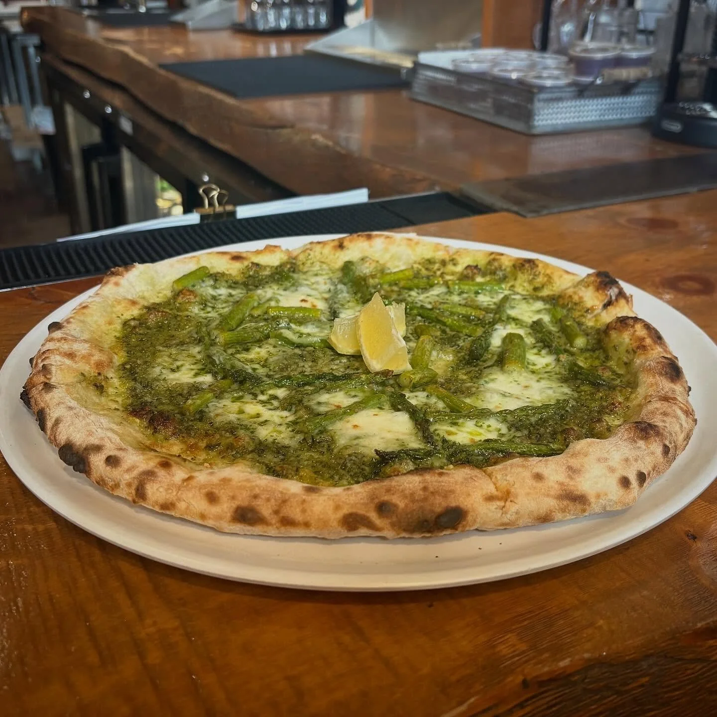 Ok you guys, please read this one! This is our special- the Prove &lsquo;Em Wrong Pie. Some of our kitchen (cough cough Ian) thinks this won&rsquo;t sell, that no one likes pesto or asparagus. Let&rsquo;s prove him I mean them wrong. I love to win a 