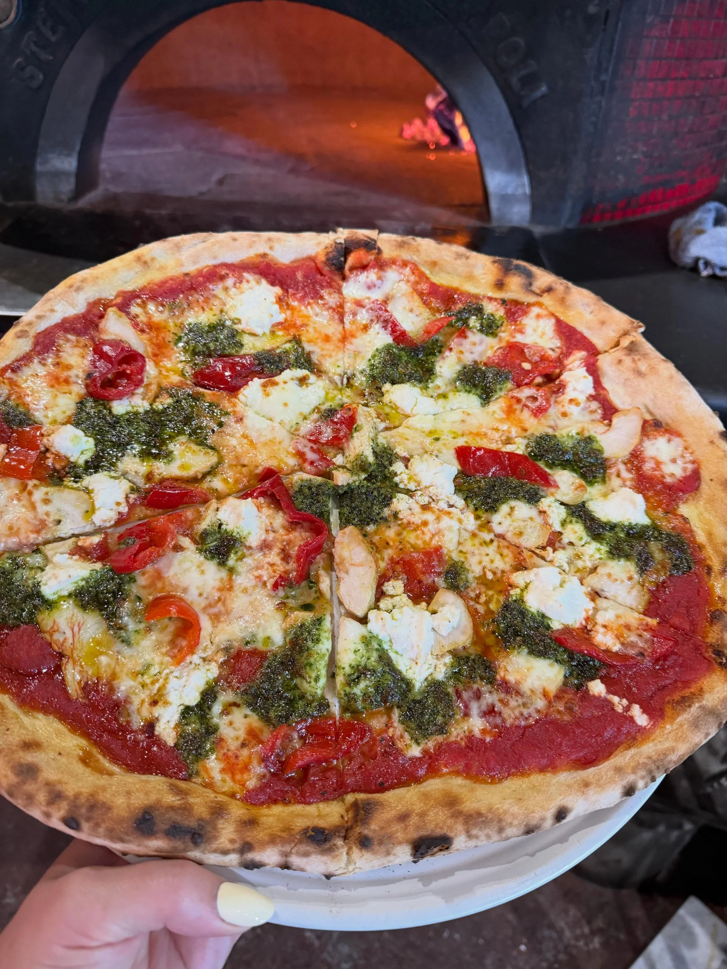 Tomato Sauce, Mozzarella, Chicken, Mama Lil&rsquo;s Peppers, Ricotta, Dollops of House Made Pesto. Yes Please.