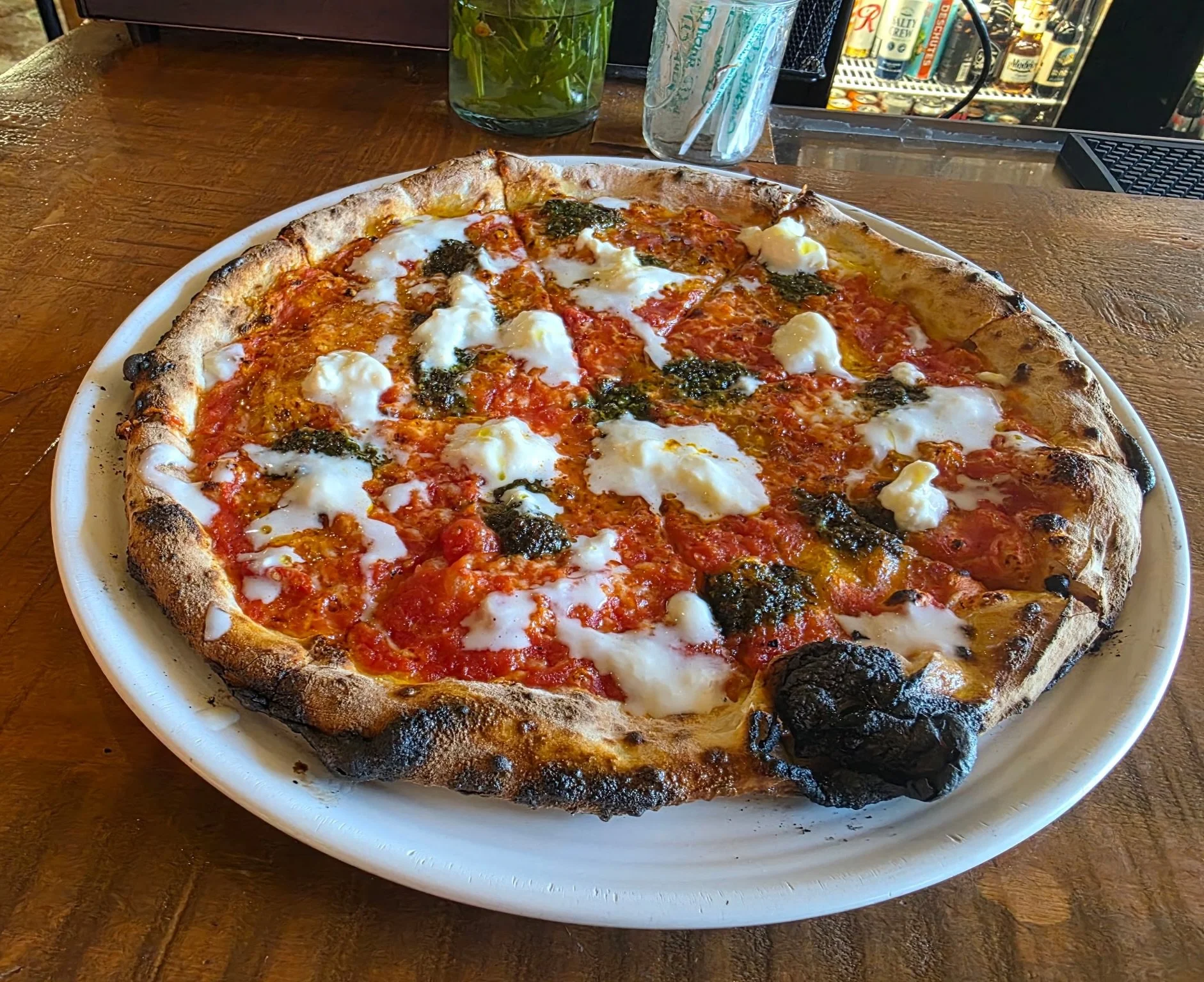 Burrata-Bing Burrata Boom! Tomato Sauce, Mozz, Parmesan, Dollops of House Made Pesto, Finished with Burrata. Come try it.