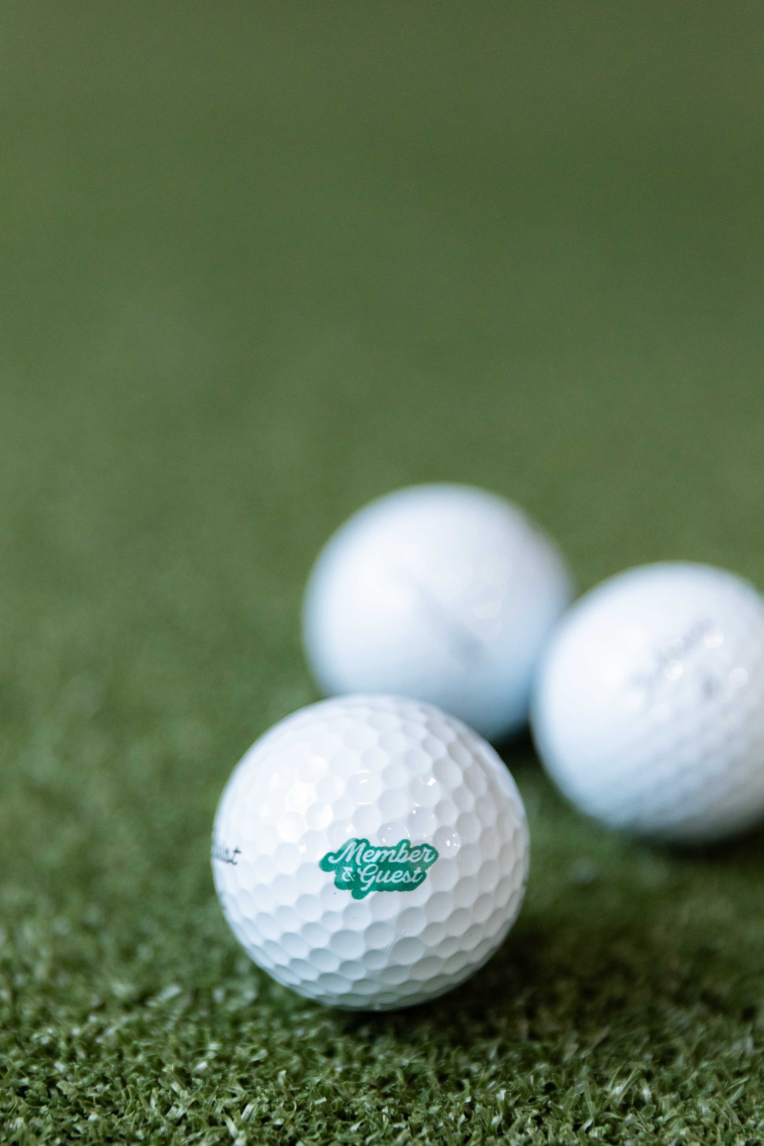 Golf balls on turf - Summer Member