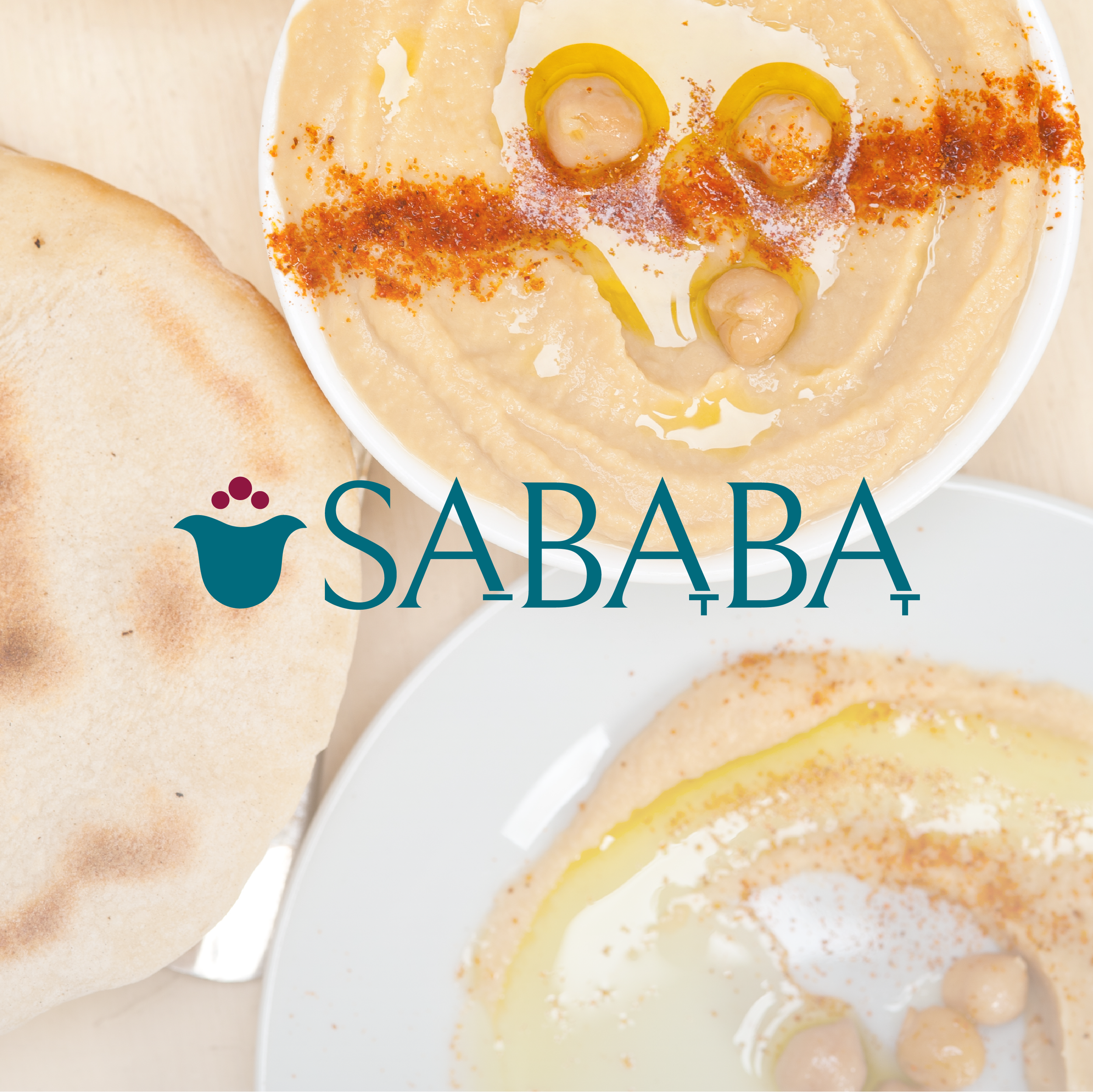 Sababa logo over pita and hummus