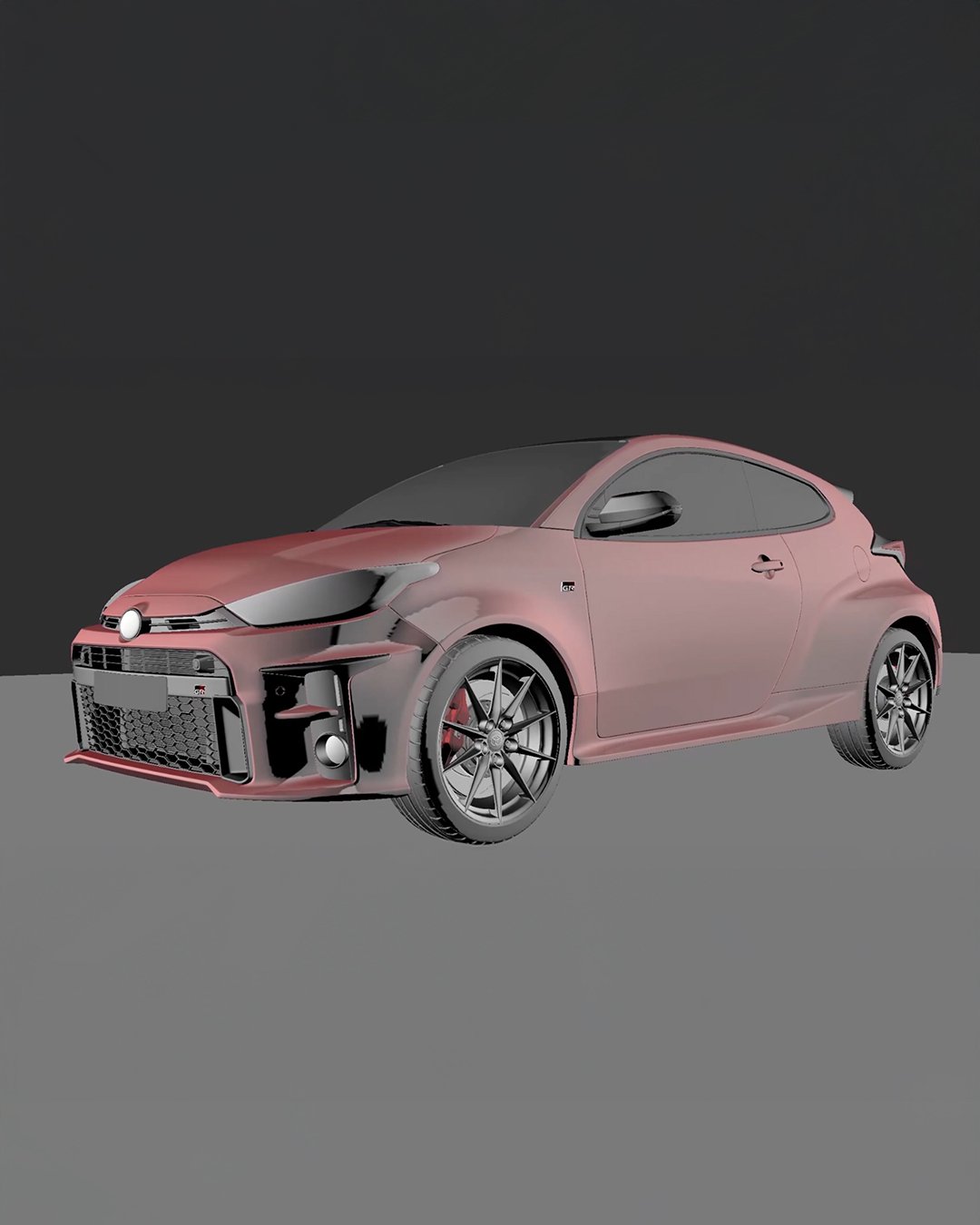 Coche deportivo de color rosa con detalles en negro, ruedas deportivas, faros delanteros y ventilaciones en el parachoques.