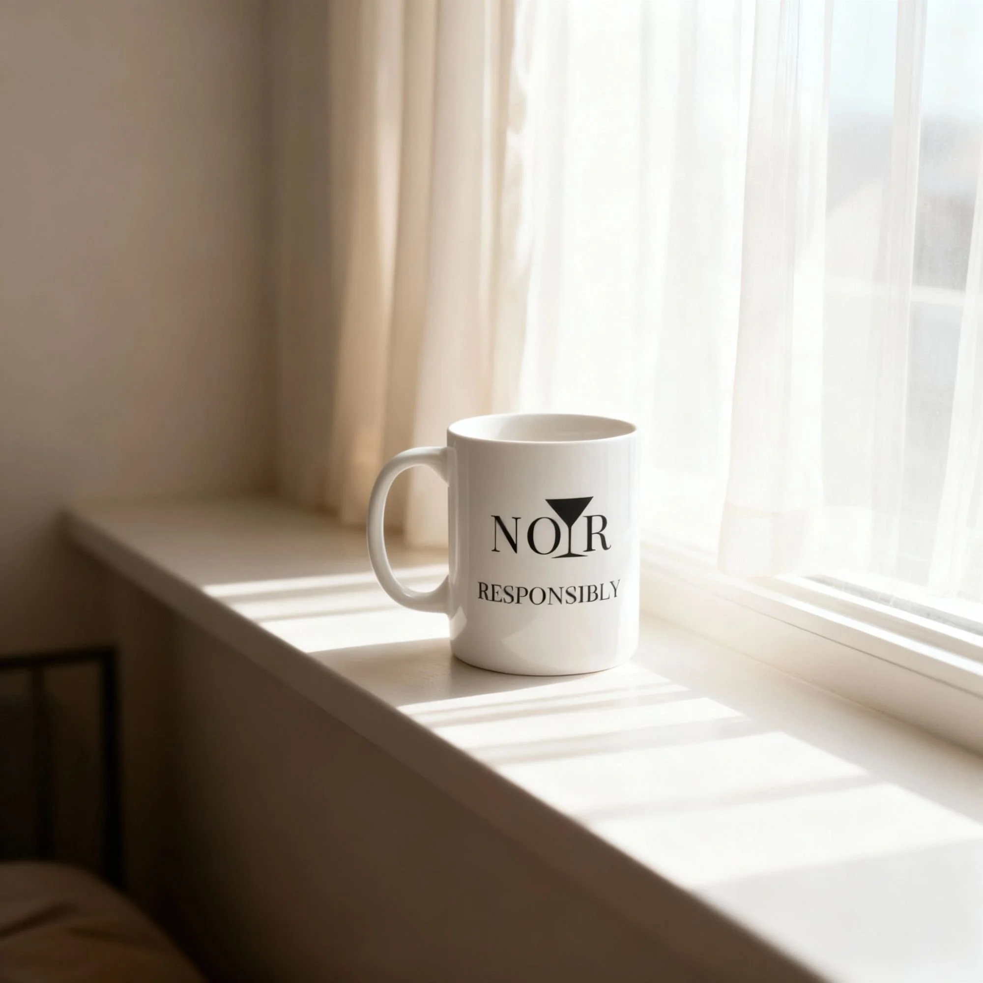 NOIR RESPONSIBLY 11 oz white ceramic mug on a shelf near window with soft morning light