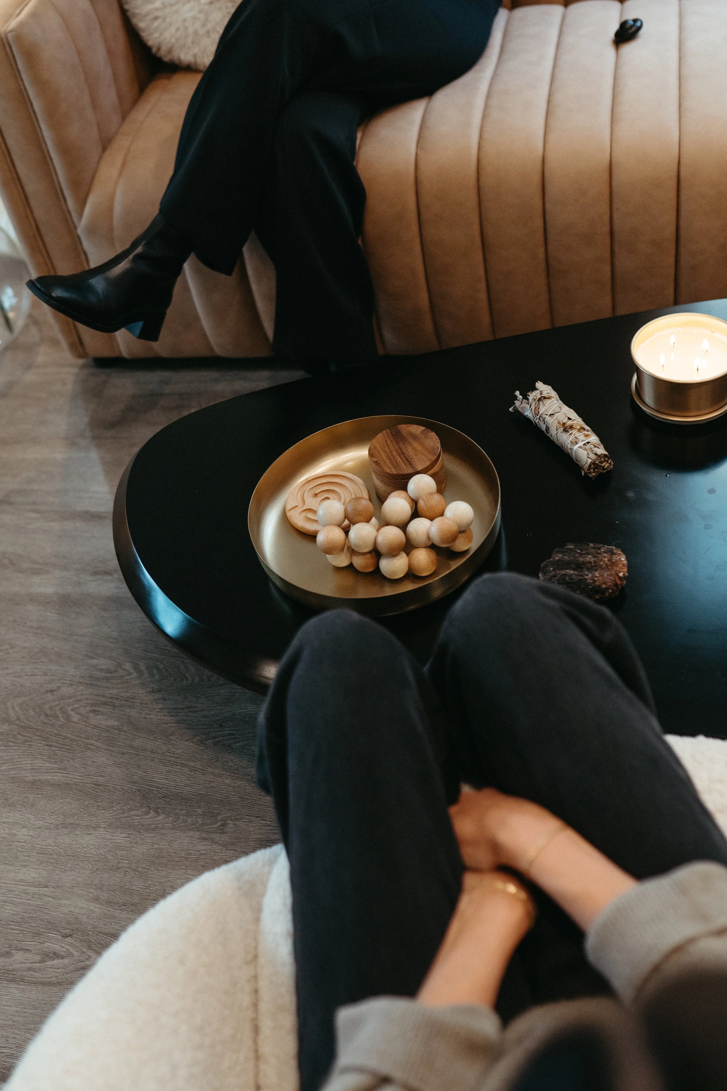 Photo from above of two people across from one another on couches
