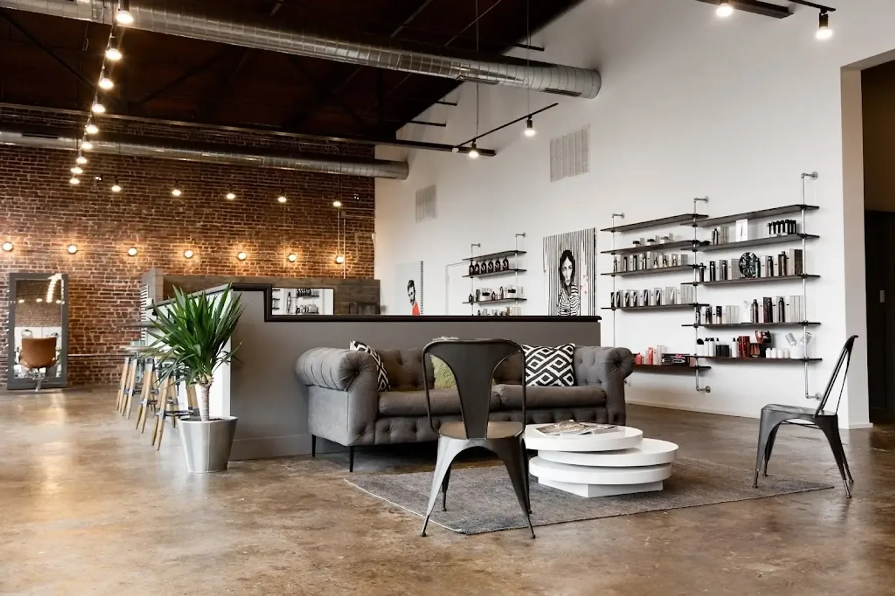 Luxury hair salon in Memphis and Lakeland TN offering haircuts, balayage, Brazilian blowouts, extensions, bridal hair, barber services, facials, and nail services