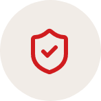 Red shield icon with a checkmark inside, representing security or protection