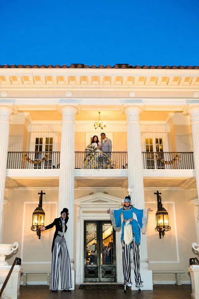 stilt walkers wedding.jpeg