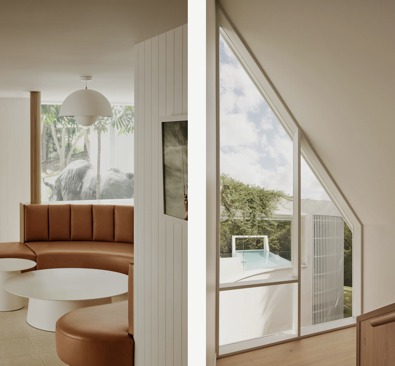 Interior of a modern house with large windows, one showing a buffalo outside and the other showing a small pool and trees outside.