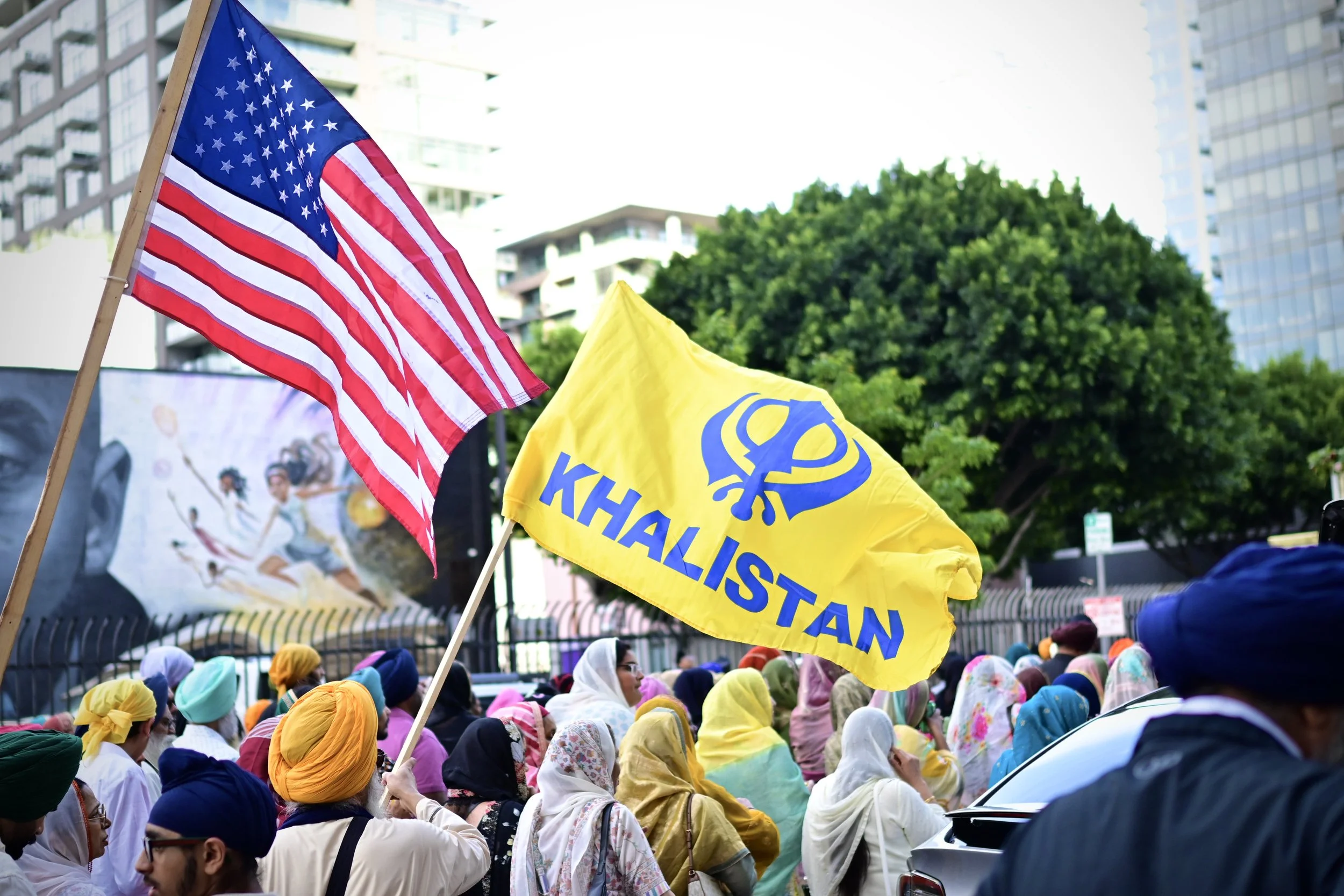 American flags and Khalistan flags being flown during the parade. (Los Angeles, 2026)