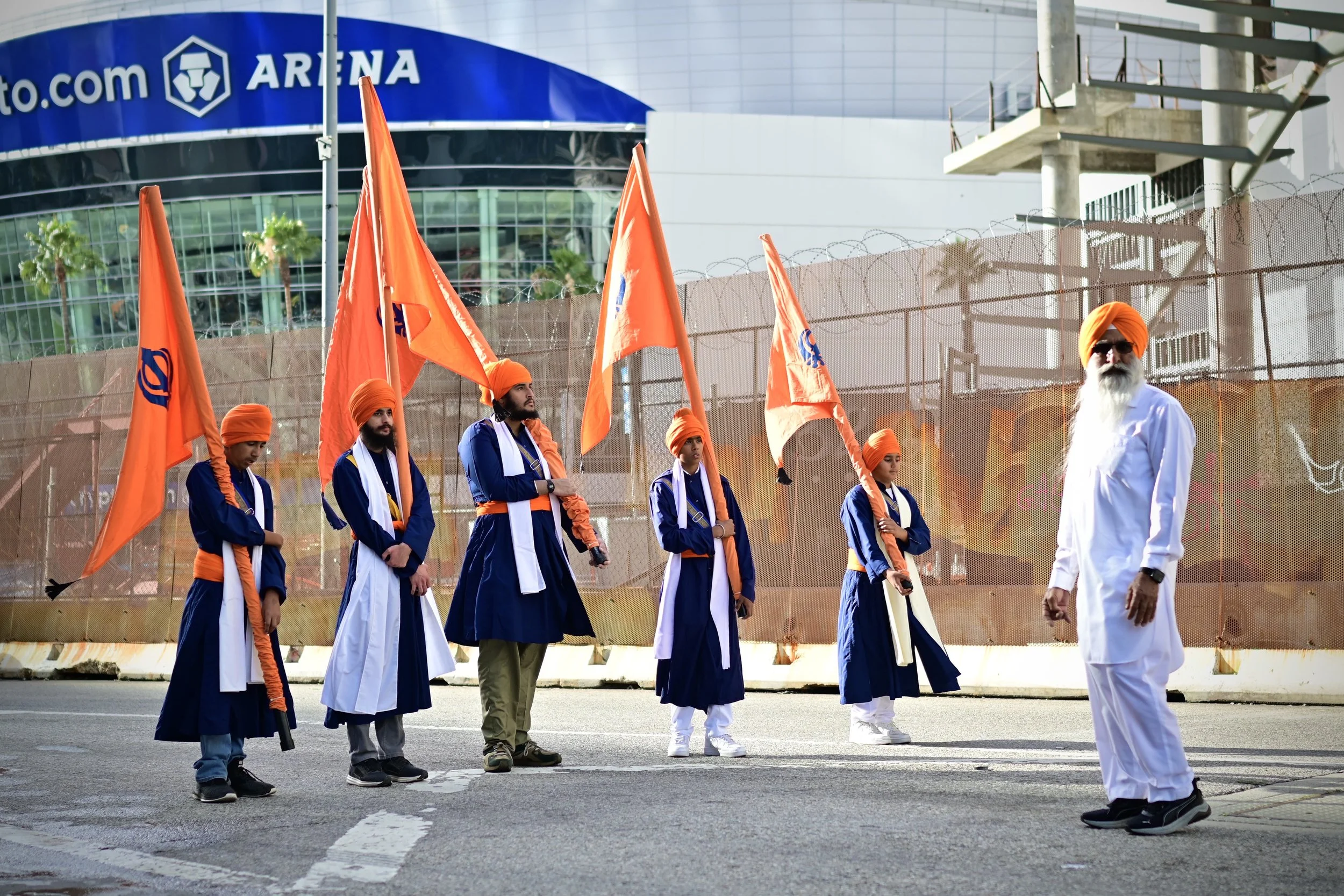 The Nishan Sahib Sevadars, they are five individuals who perform seva (selfless service) and carry the five flags of Nishan Sahib. (Los Angeles, 2026)