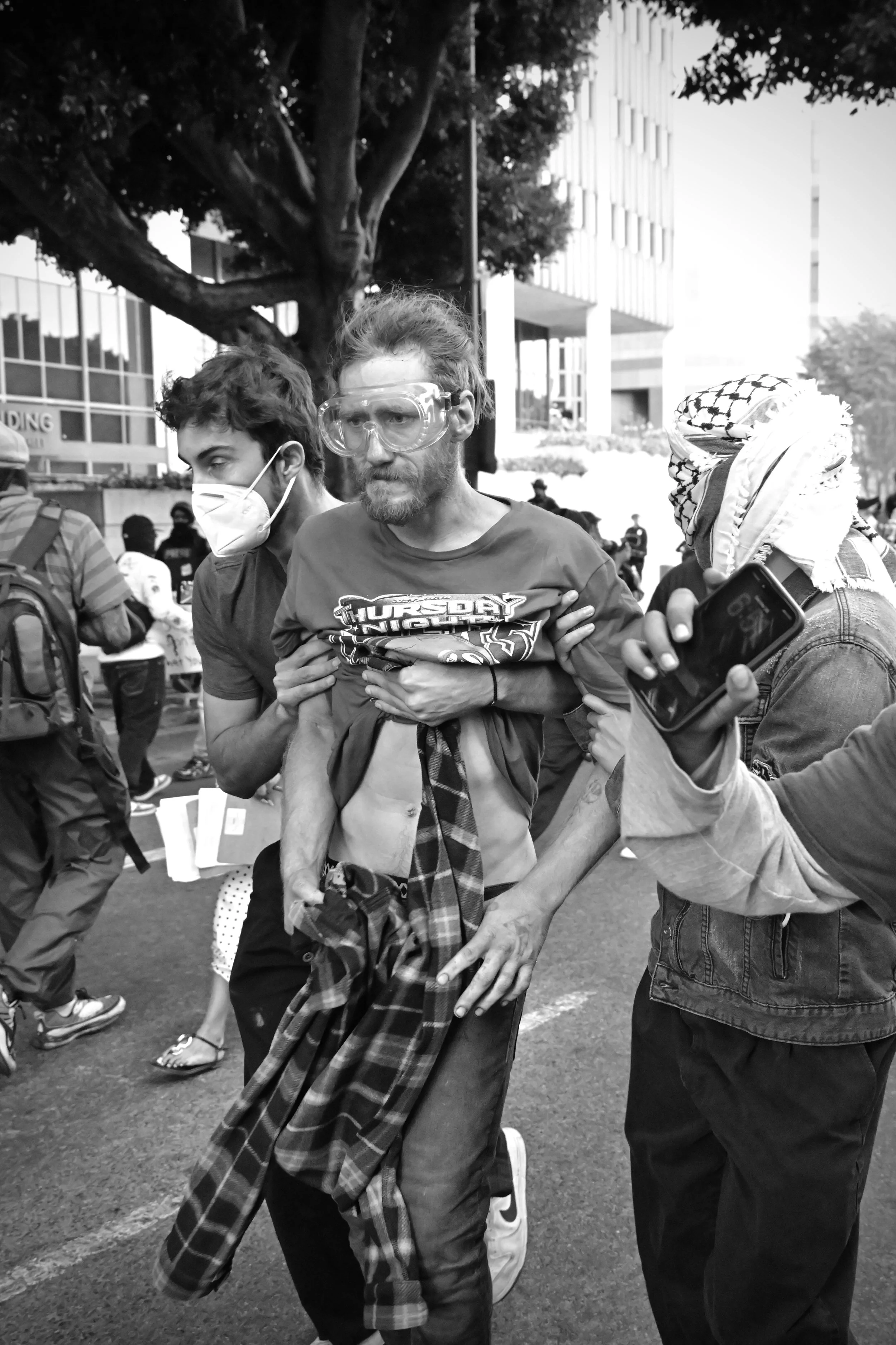 Protester after being trampled by LAPD mounted officers and shot with pepper balls. (Los Angeles, 2026)