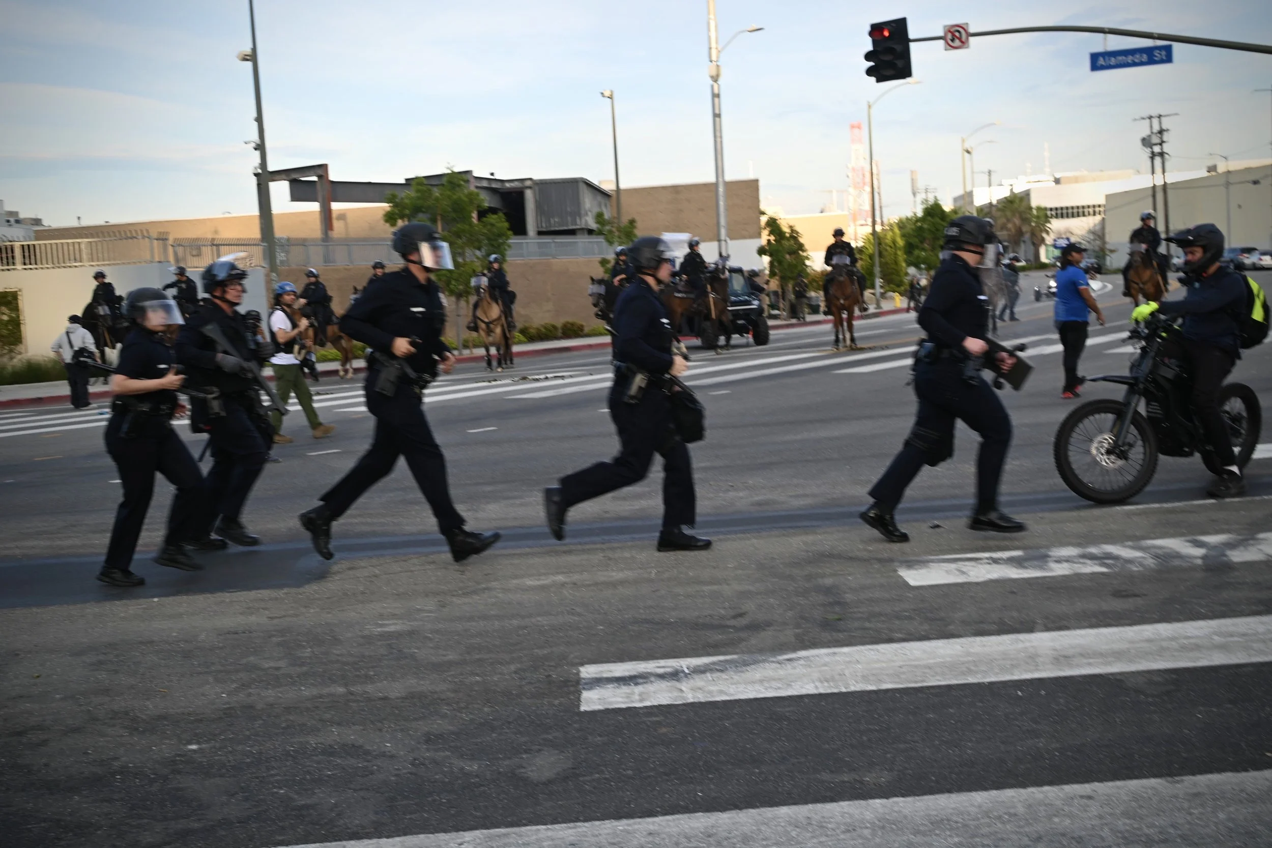 LAPD officers running for crowd control. (Los Angeles, 2026)