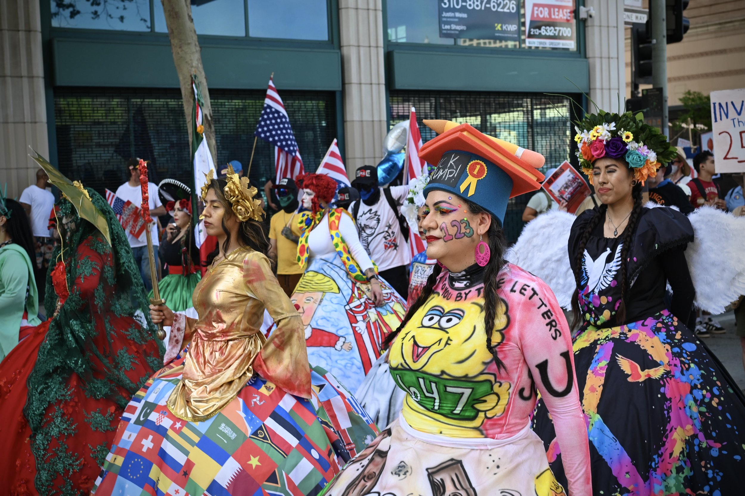 Women wearing handmade dresses at the protest. (Los Angeles, 2026)