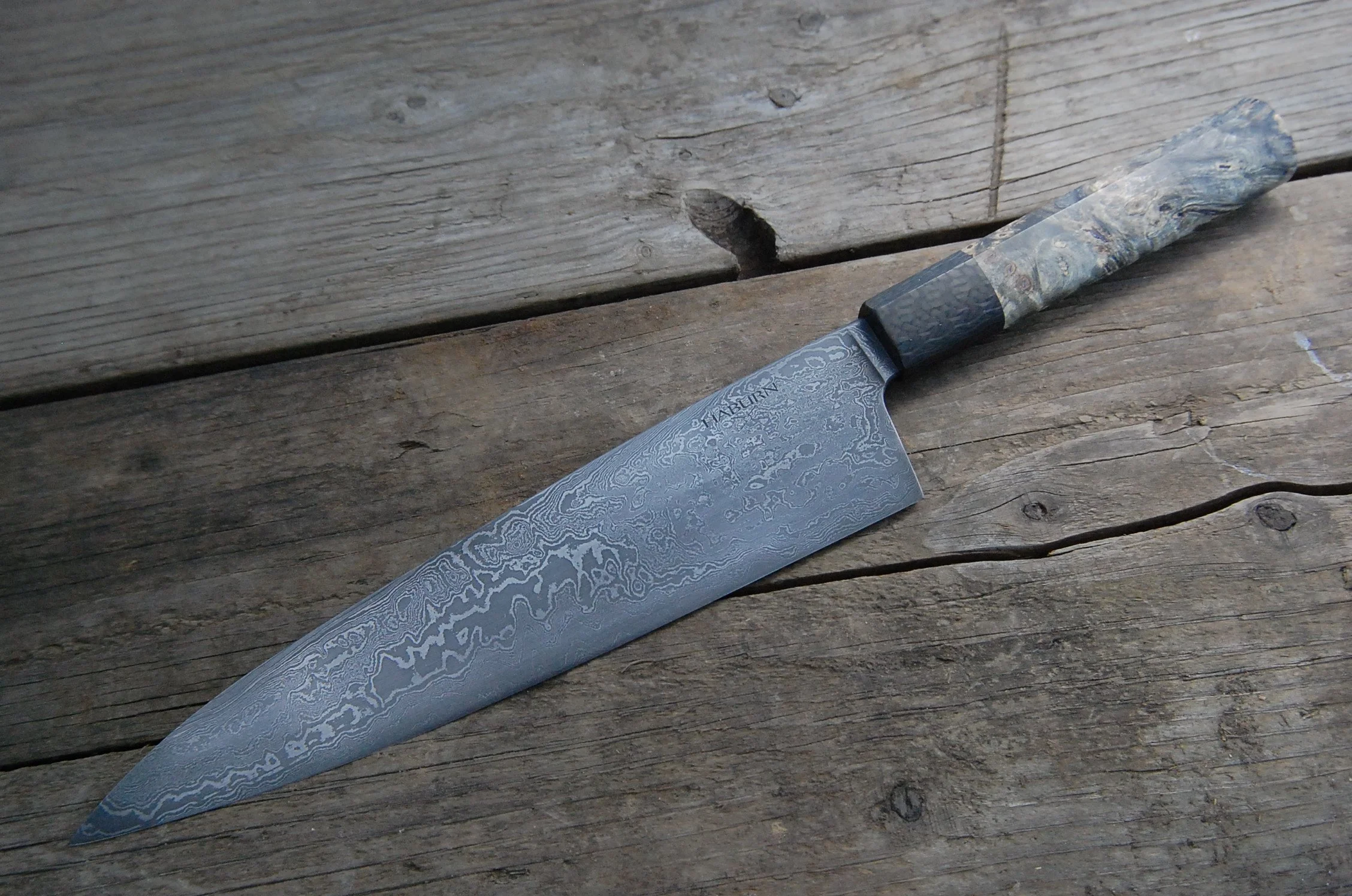 Gyuto in damascus, carbon fiber, and buckeye burl.