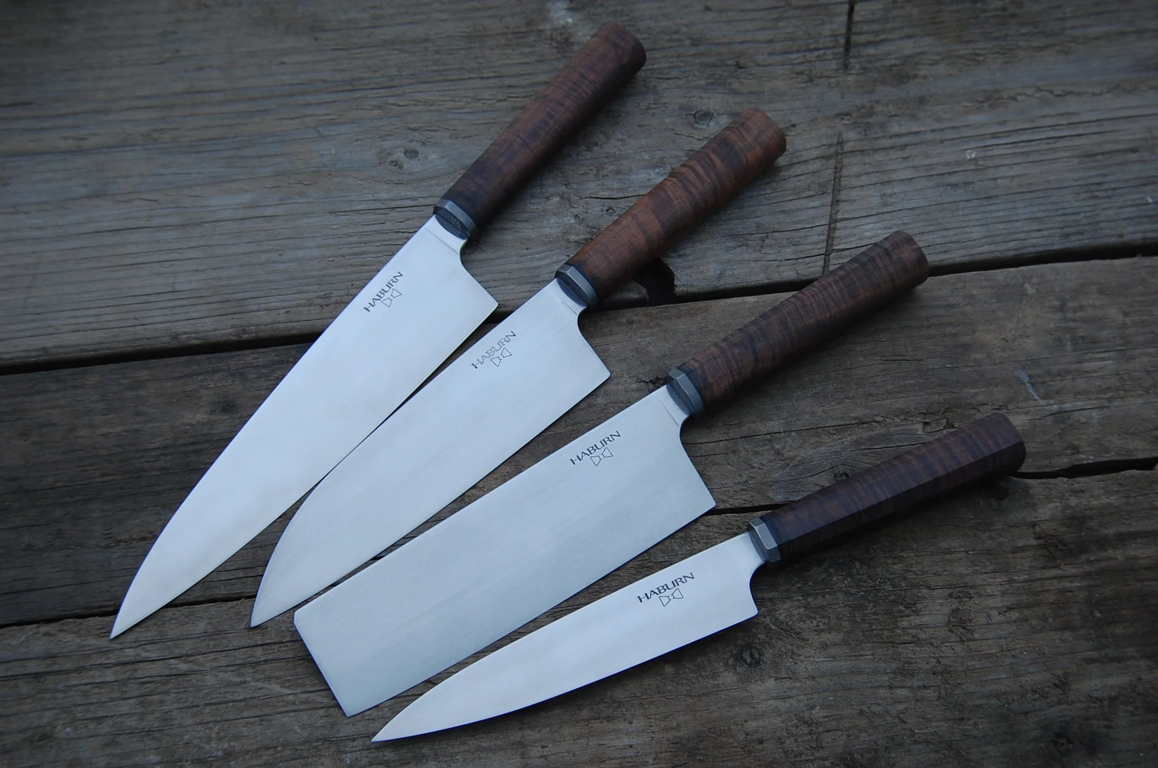 Custom set in 52100 high carbon, damascus bolster, and ringed gidgee