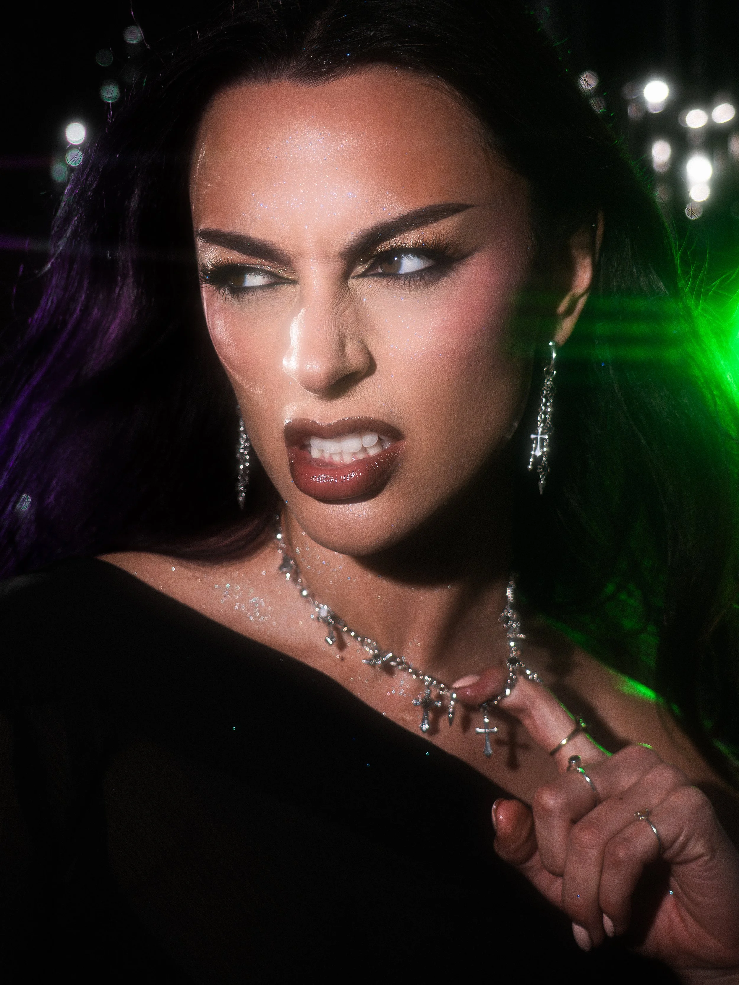 Sharp graphic liner editorial makeup on Tia Harris, inspired by THIQUE by Beyoncé for 4 years of RENAISSANCE, featuring Stolen Girlfriends Club's "The Defiant Ones" jewellery. Makeup, photography, cinematography, post-production and creative directio