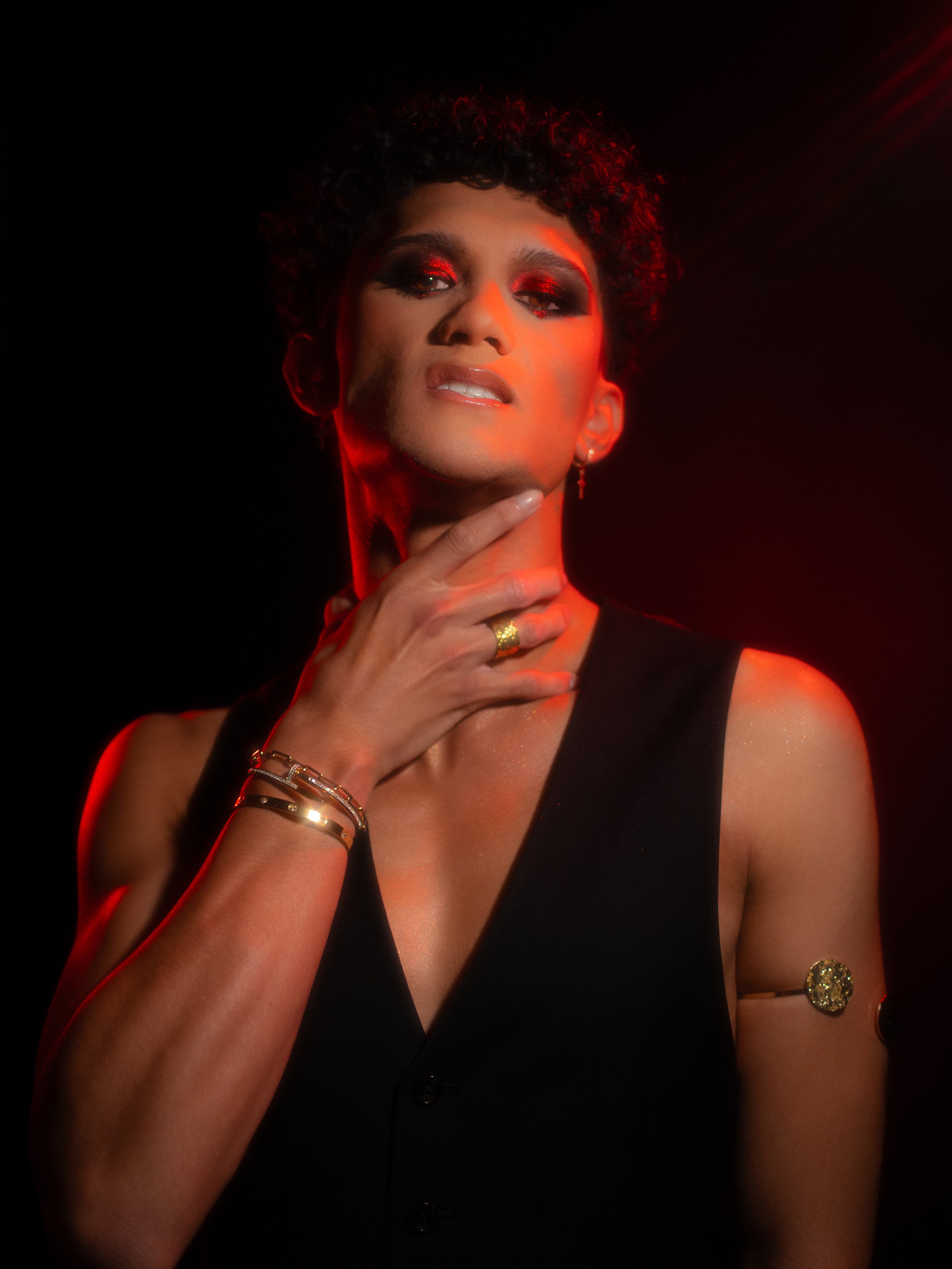 Cherry (Hare Hemopo) in a red makeup look created and photographed by Kylee De Thier