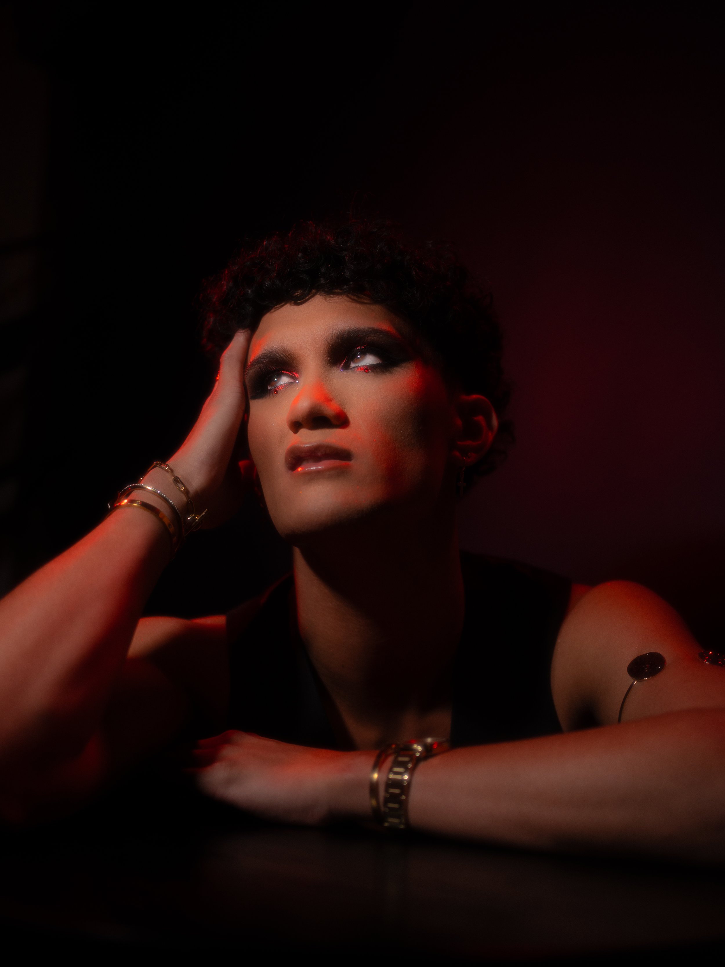 Cherry (Hare Hemopo) in a red makeup look created and photographed by Kylee De Thier