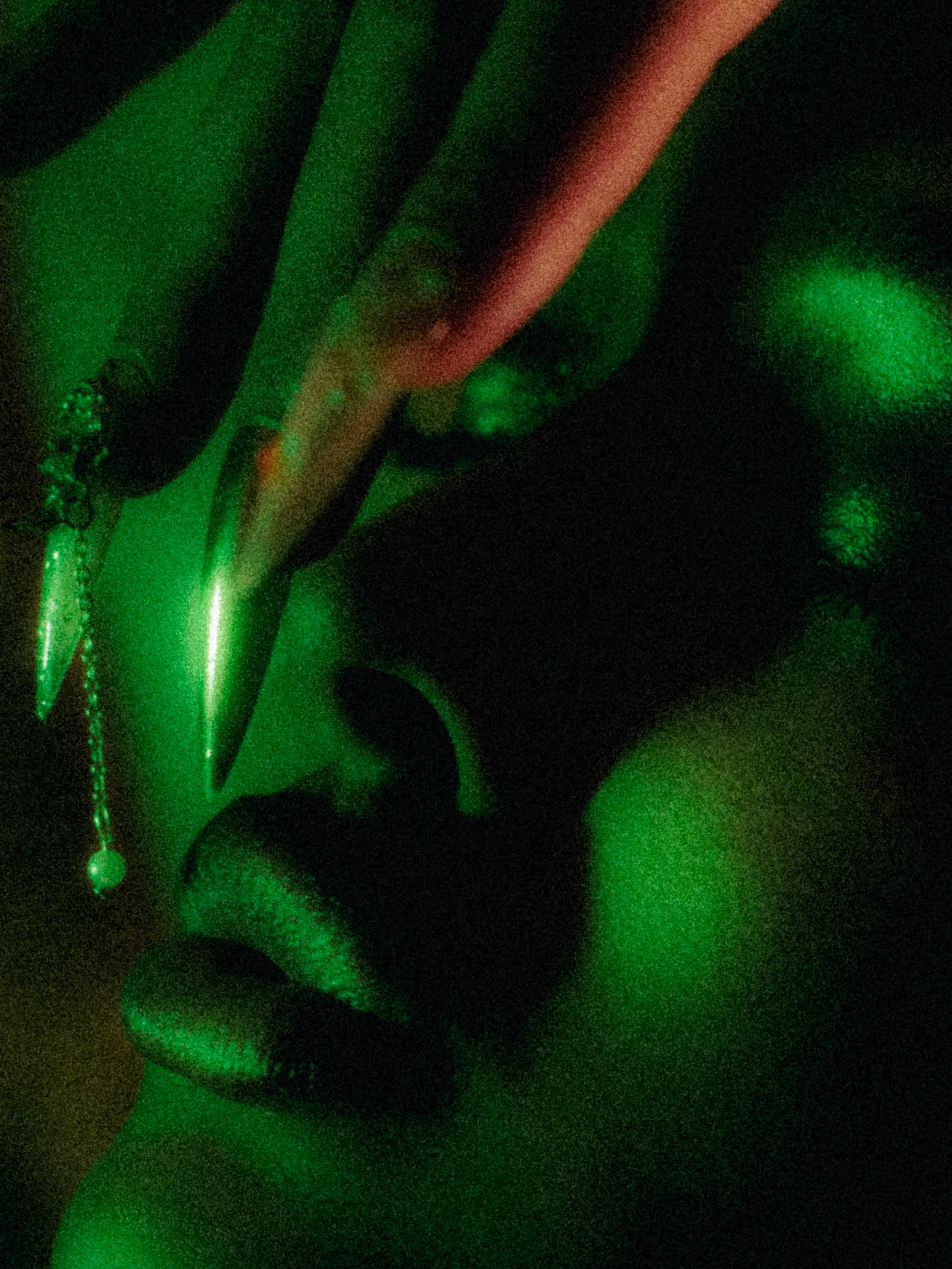 Kris Fox in a green makeup look and photography set created and directed by Kylee De Thier, New Zealand makeup artist, creative e director, photographer and content creator