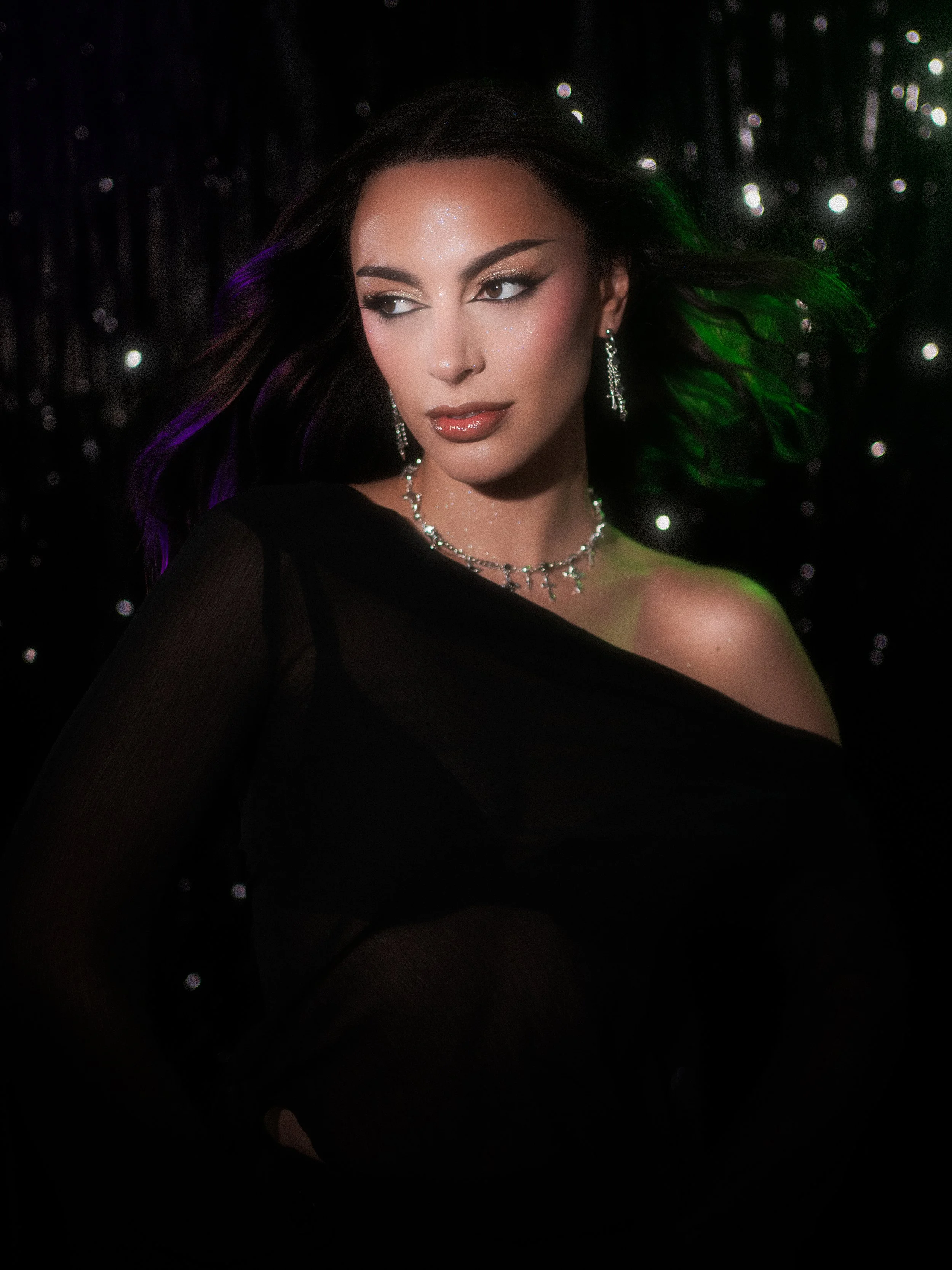 Sharp graphic liner editorial makeup on Tia Harris, inspired by THIQUE by Beyoncé for 4 years of RENAISSANCE, featuring Stolen Girlfriends Club's "The Defiant Ones" jewellery. Makeup, photography, cinematography, post-production and creative directio