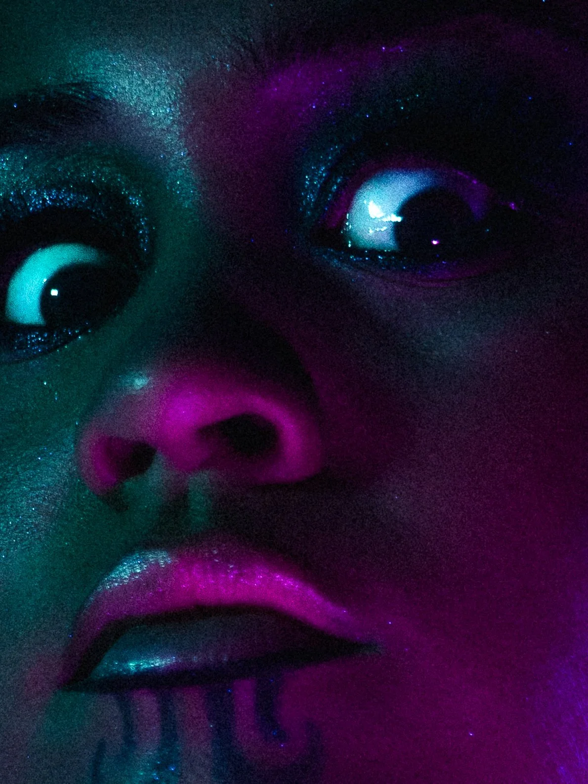 Courtnee Amorangi Māori Content Creator in a editorial makeup look and photoshoot by Kylee De Thier, inspired by Pāua and Matariki, purple and green lights