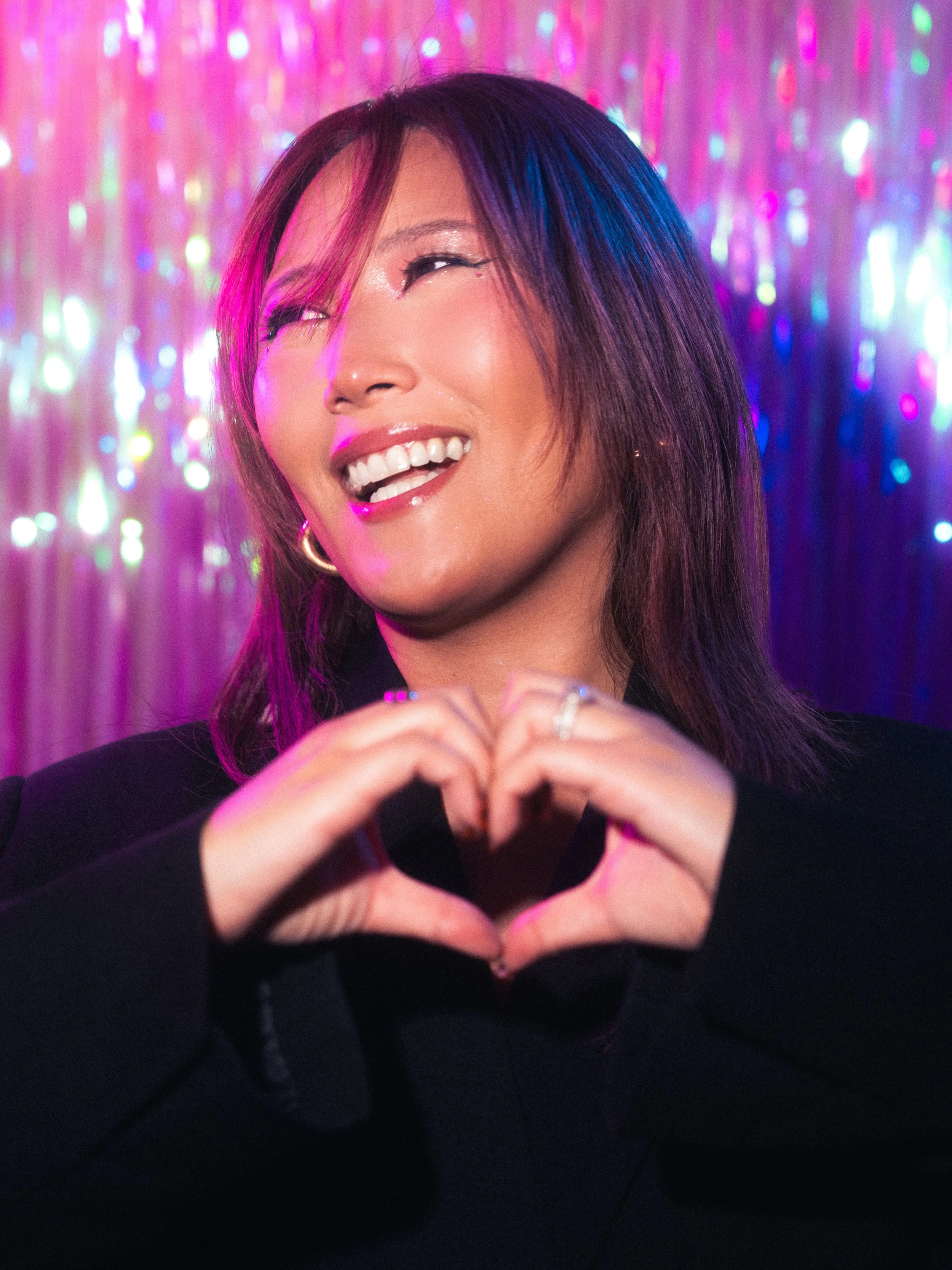 Jasmine Kim in a makeup look and photoshoot created and directed by Kylee De Thier, featuring pinks, blues, greens and an iridescent colour story 