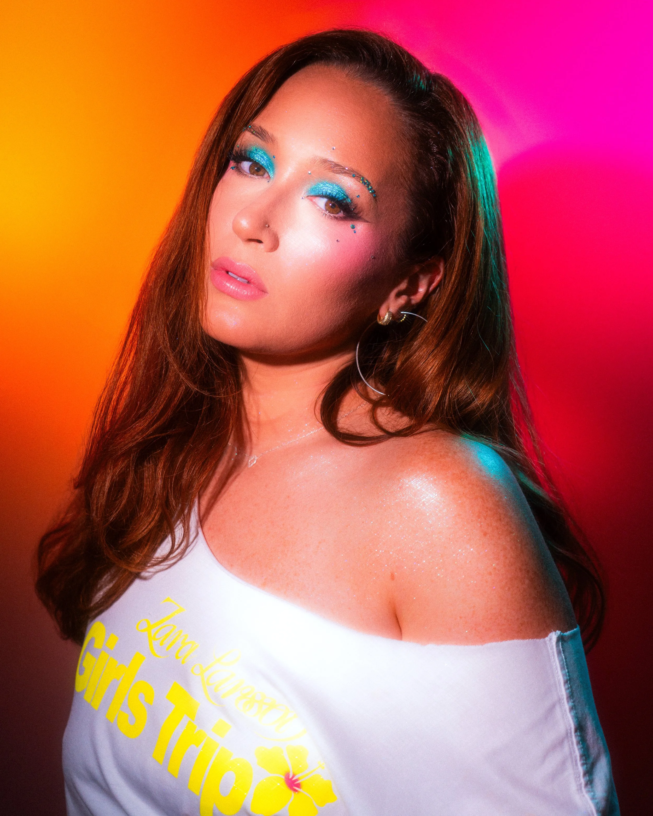 Ella Monnery, New Zealand Singer, wearing a teal Zara Larsson Midnight Sun inspired makeup look created by Kylee De Thier, photography and creative by Kylee De Thier