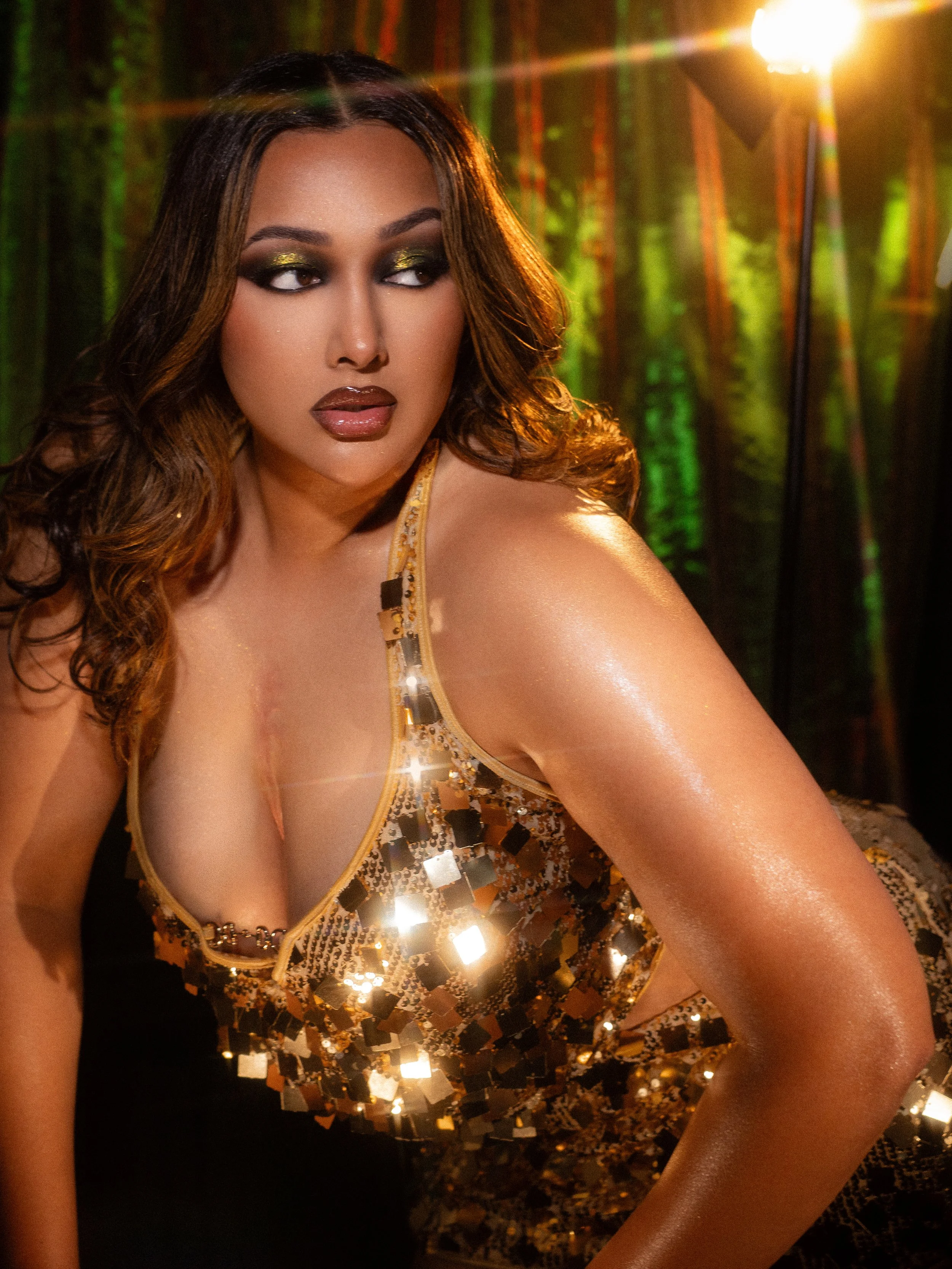 Kris Fox in a green makeup look and photography set created and directed by Kylee De Thier, New Zealand makeup artist, creative e director, photographer and content creator