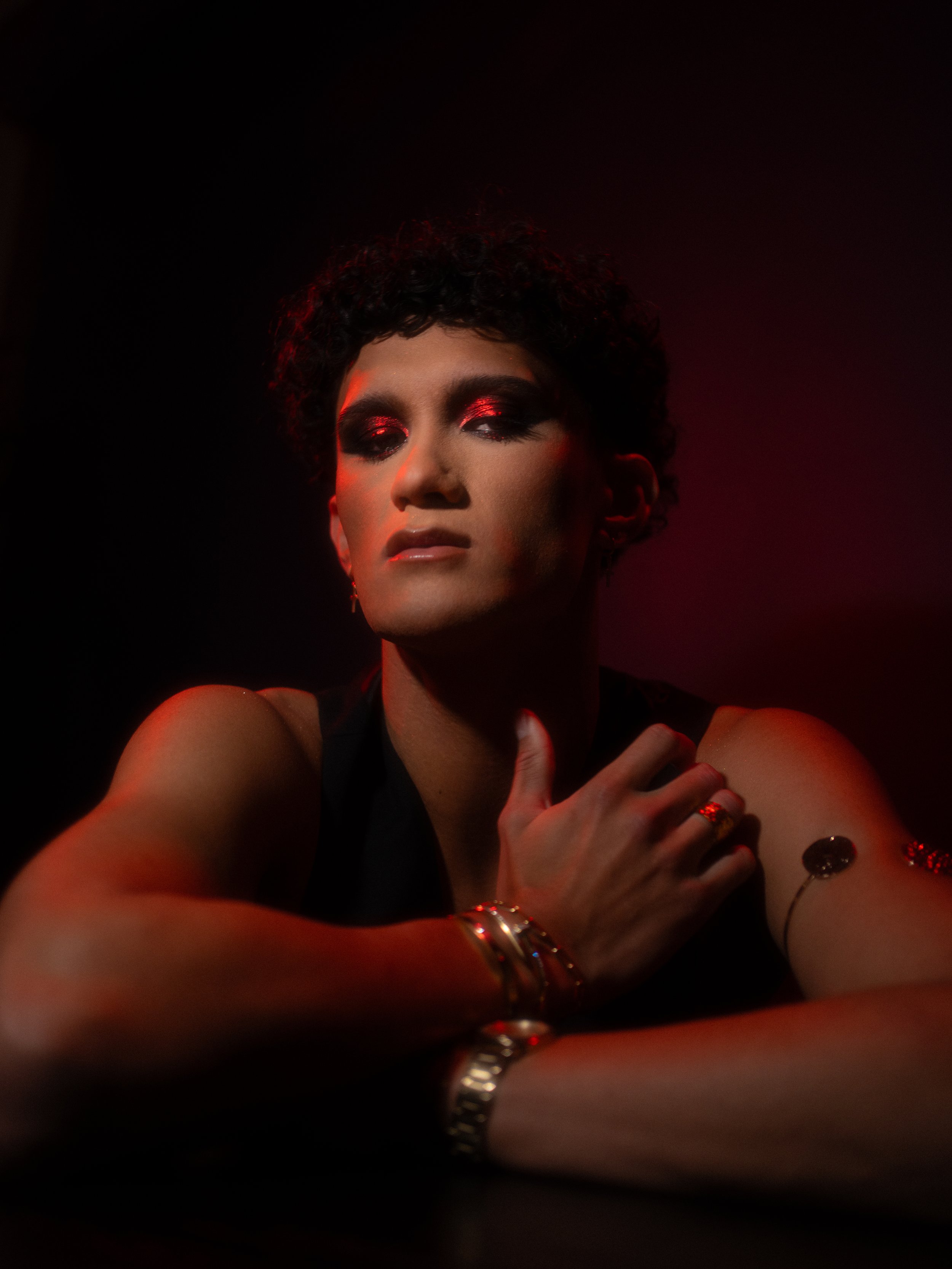 Cherry (Hare Hemopo) in a red makeup look created and photographed by Kylee De Thier