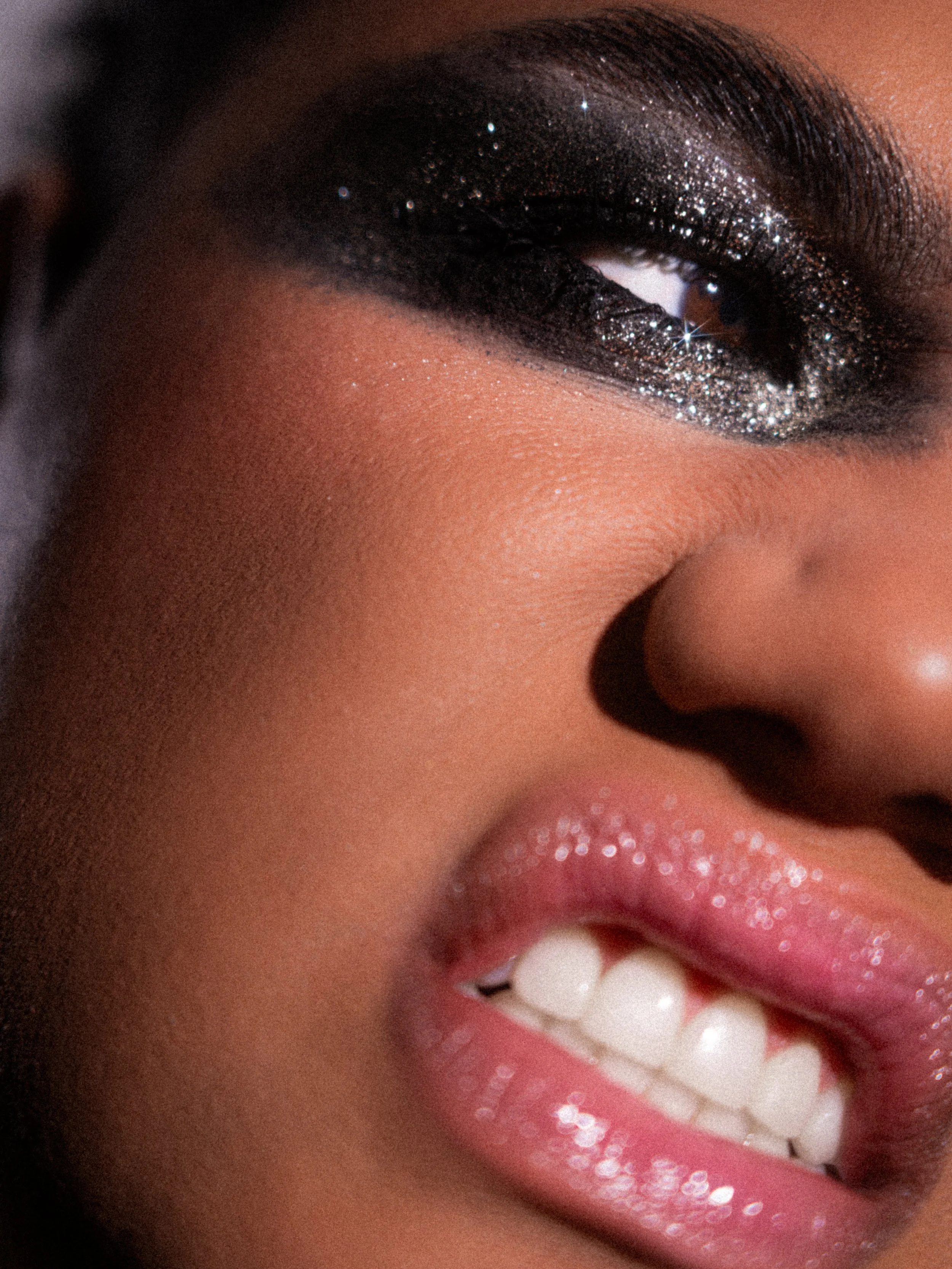 Kylee De Thier up close in a sparkly silver editorial smokey eye makeup look inspired by Charli XCX Rock Music, portrait photography
