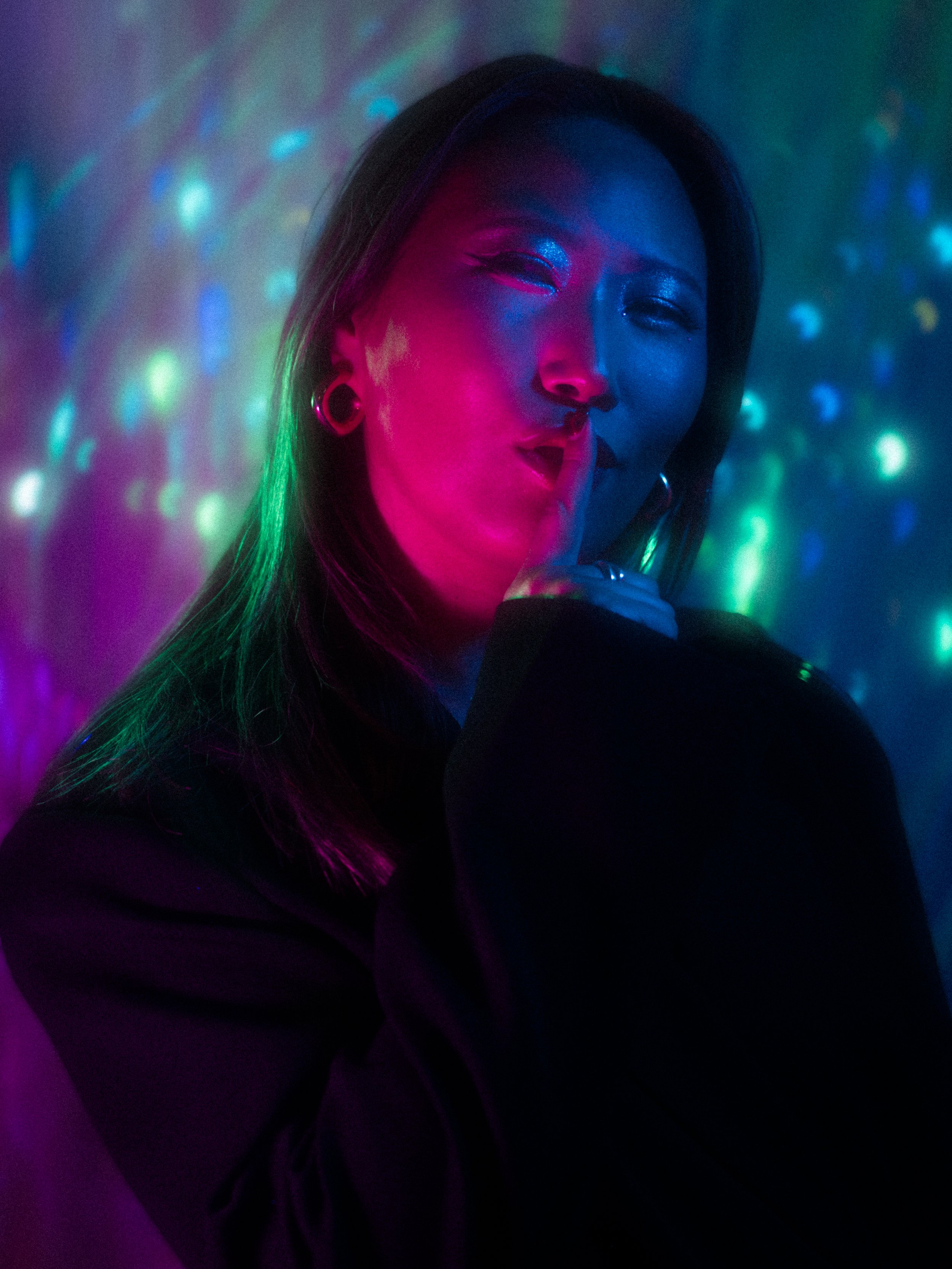 Jasmine Kim in a makeup look and photoshoot created and directed by Kylee De Thier, featuring glowy pinks, blues, greens and an iridescent colour story, 80s glow technicolor