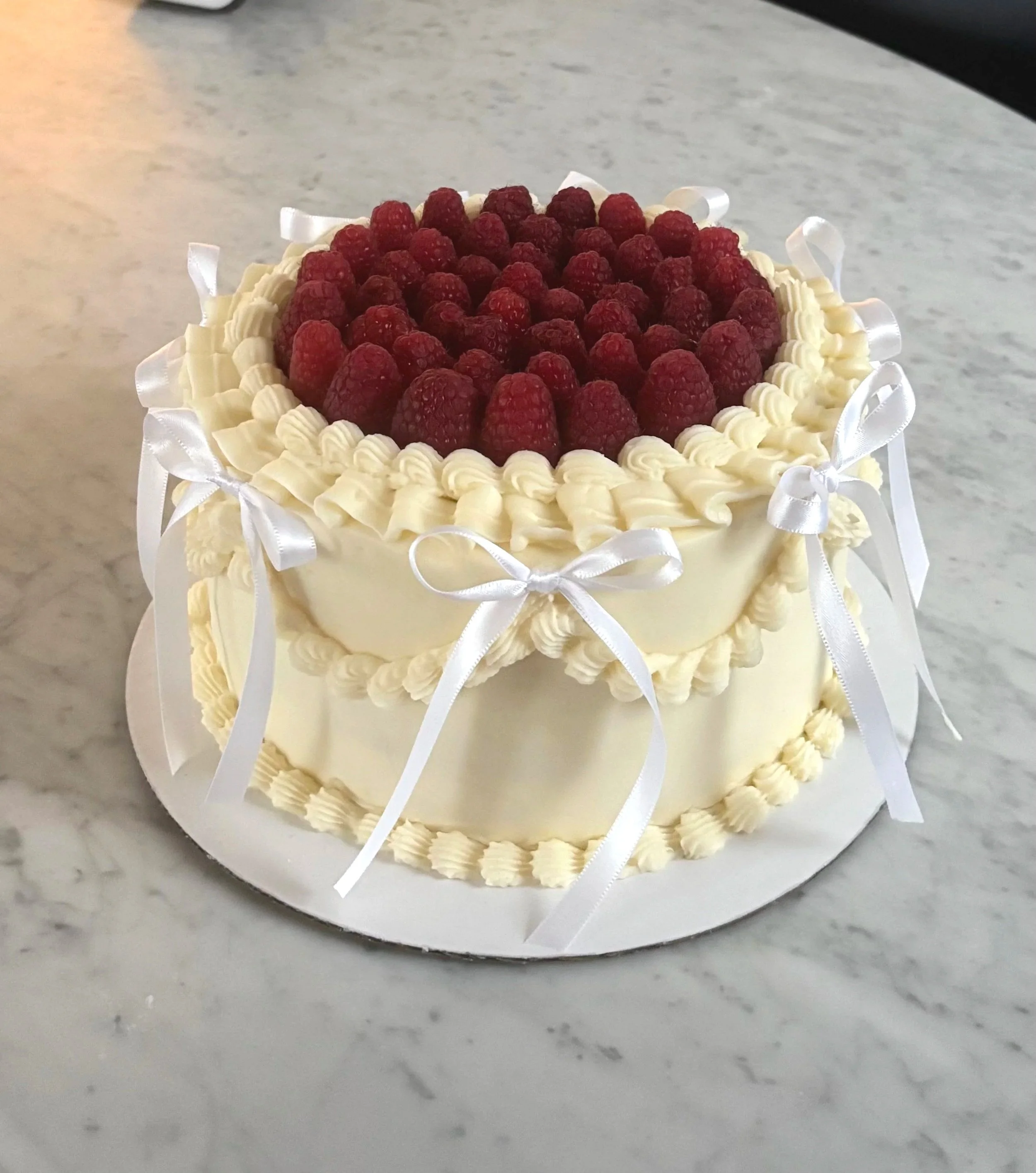 Vintage Vanilla Cake with Vanilla Frosting and Raspberry Preserve