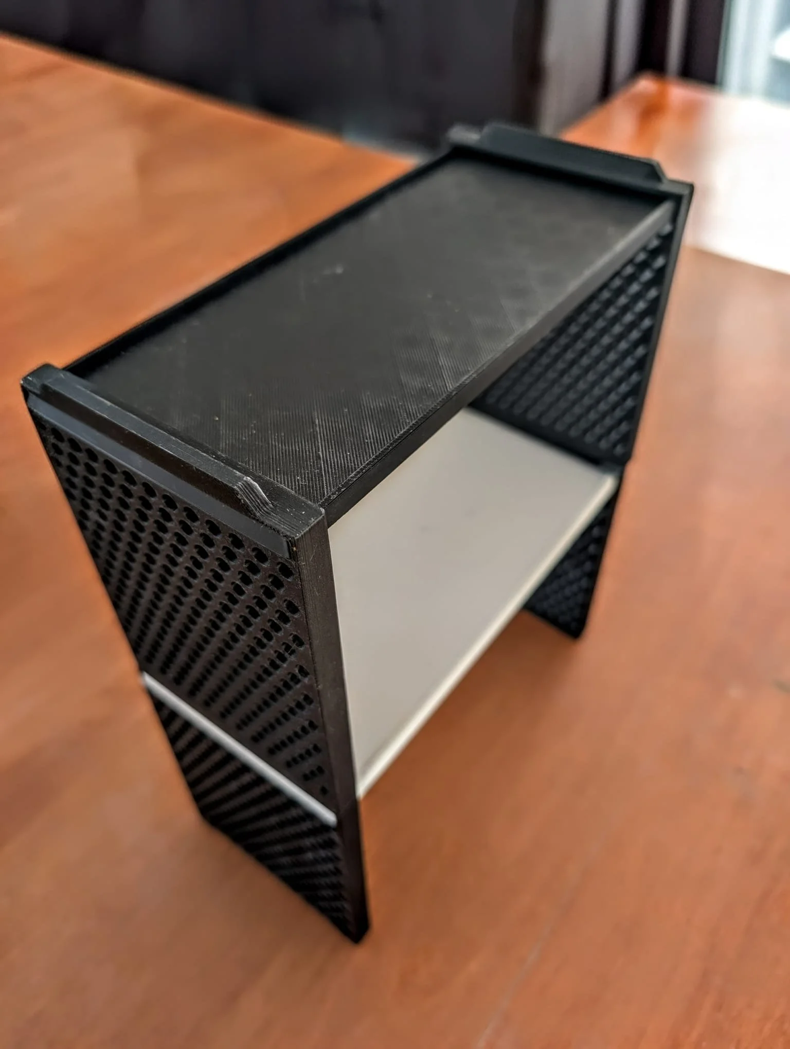 A stackable organizer. Put it in your cupboard to stack your cups